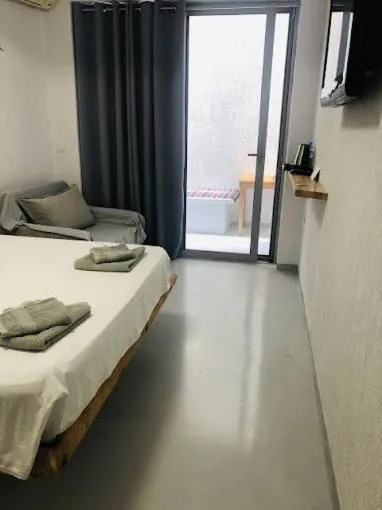 Bed in Geo & Art Boutique Hotel Himara