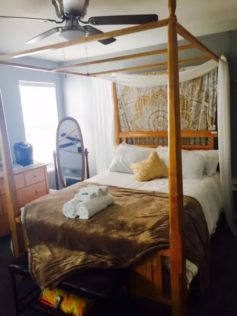 Bed in Boho Chic Beach Suite