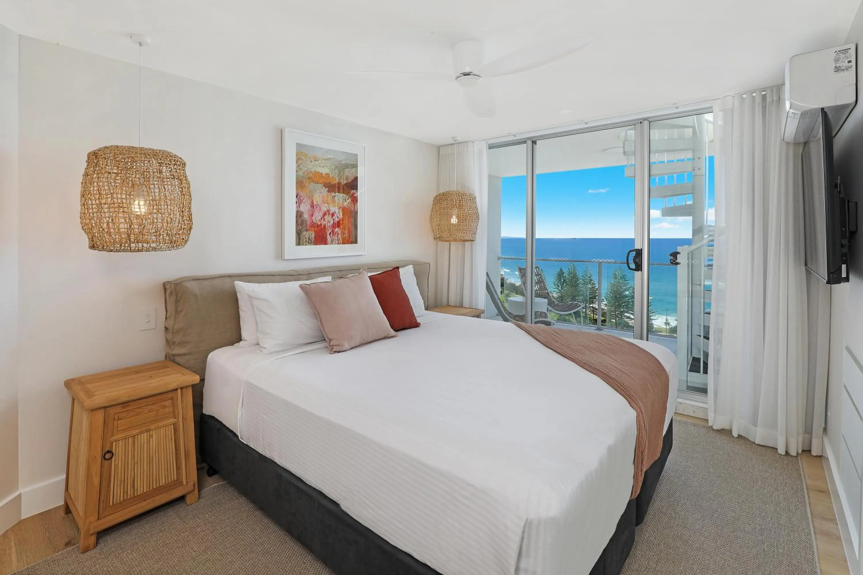 Bed in Mandolin Beachfront Resort