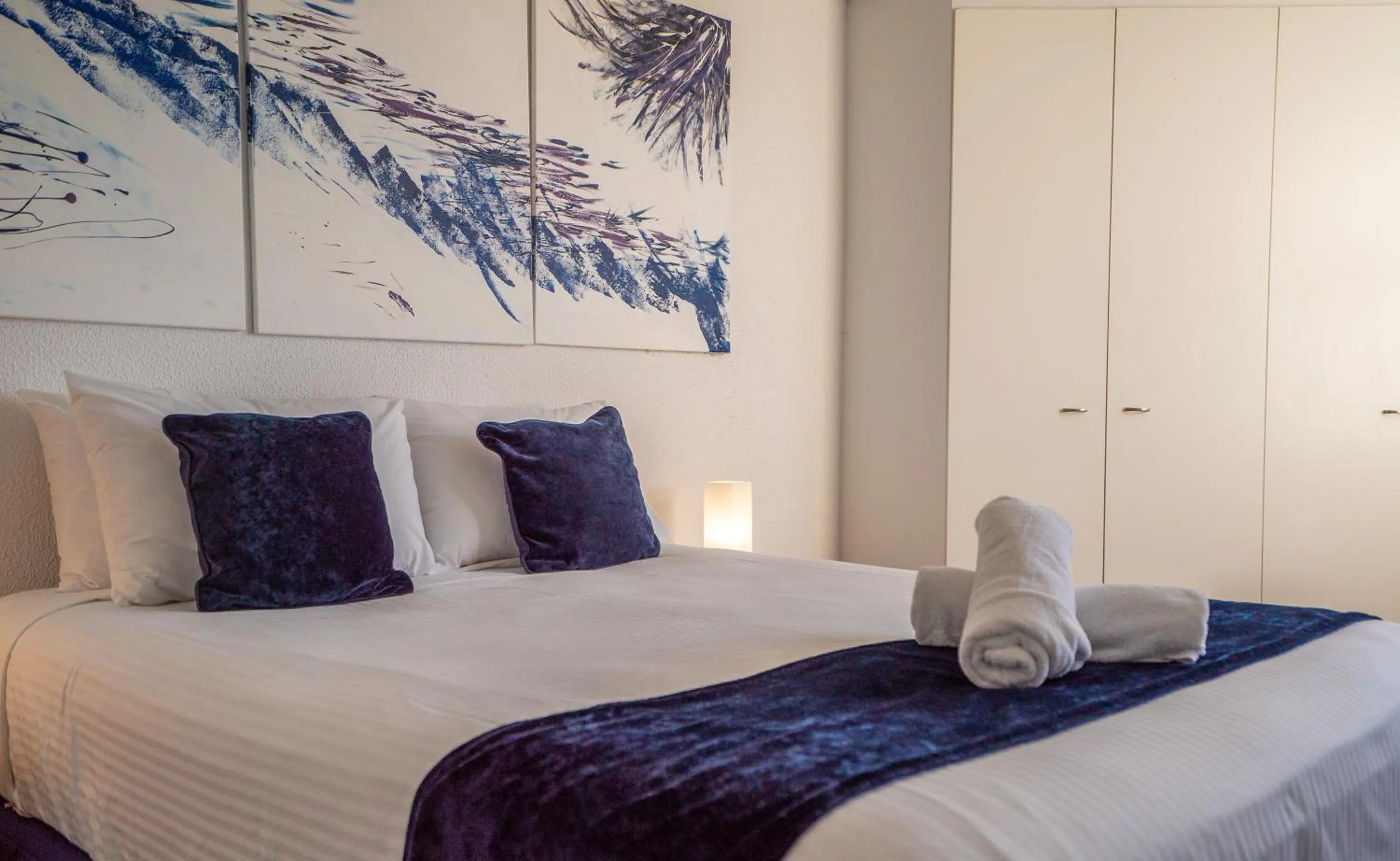 Bed in Mandolin Beachfront Resort