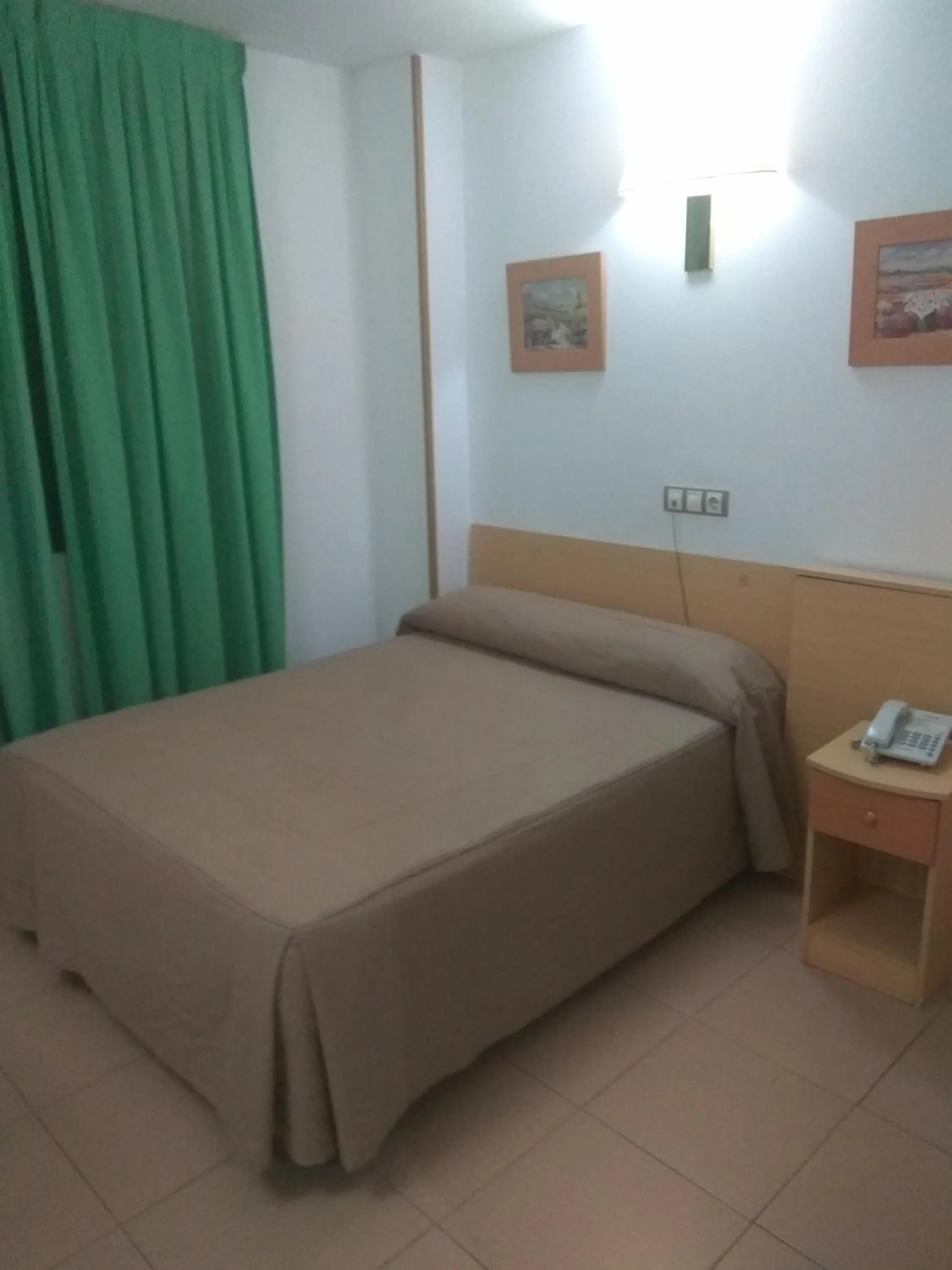 Bed in Hostal El Arco