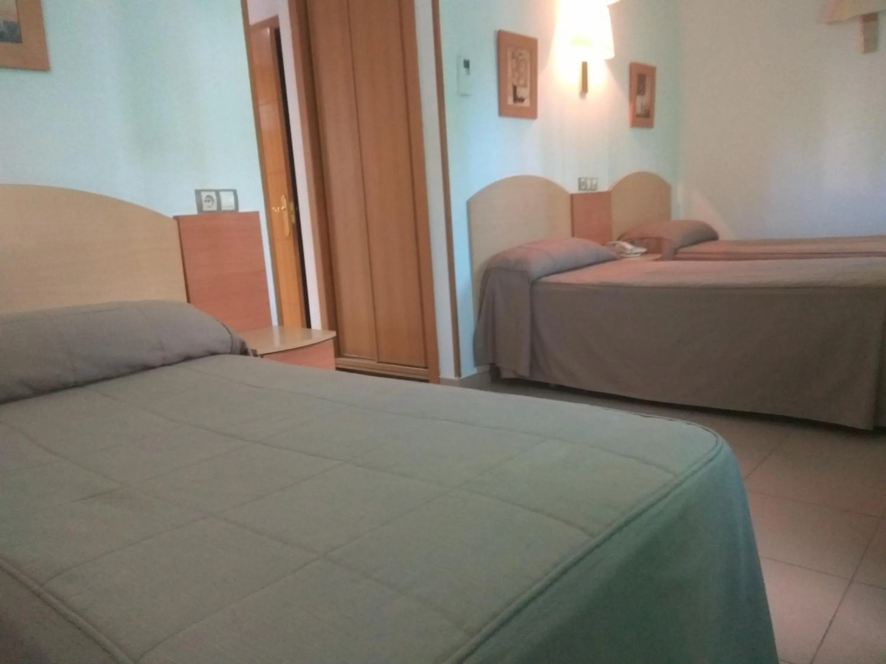 Bed in Hostal El Arco