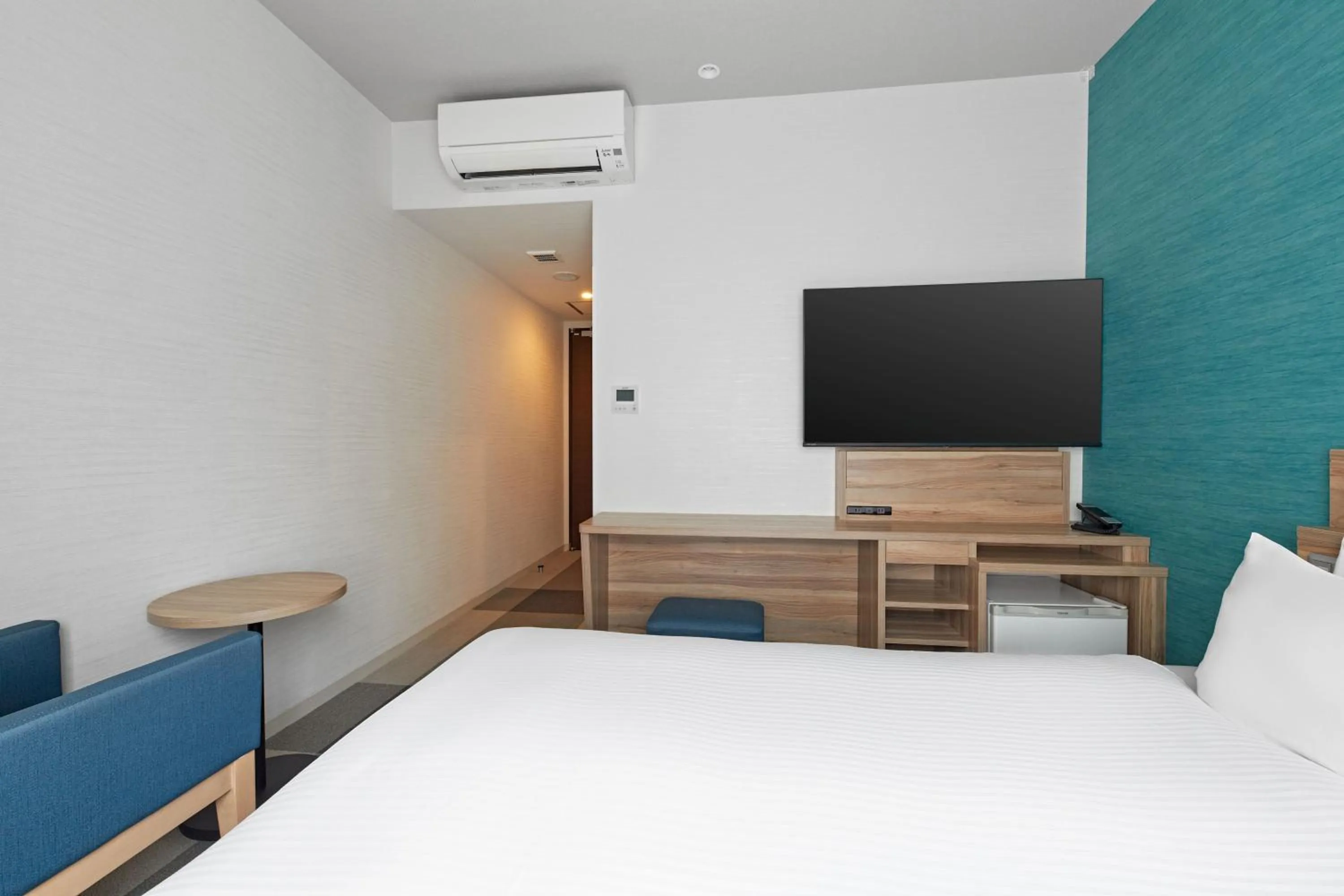 Bed in Sotetsu Fresa Inn Osaka Shinsaibashi