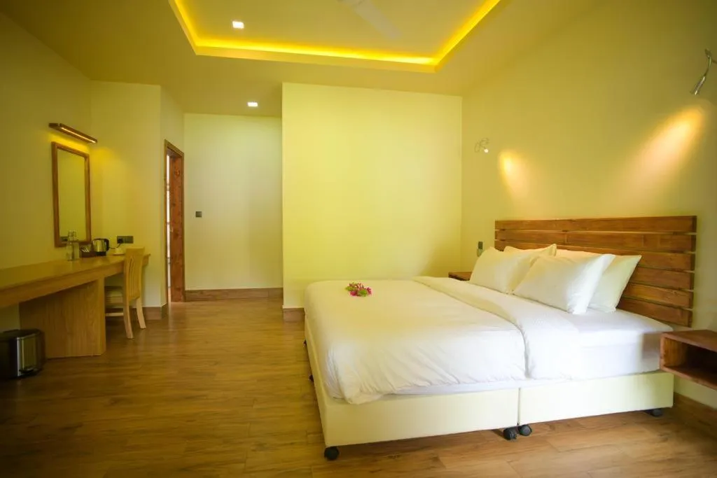 Bed in Tiger Shark Residence & Dive