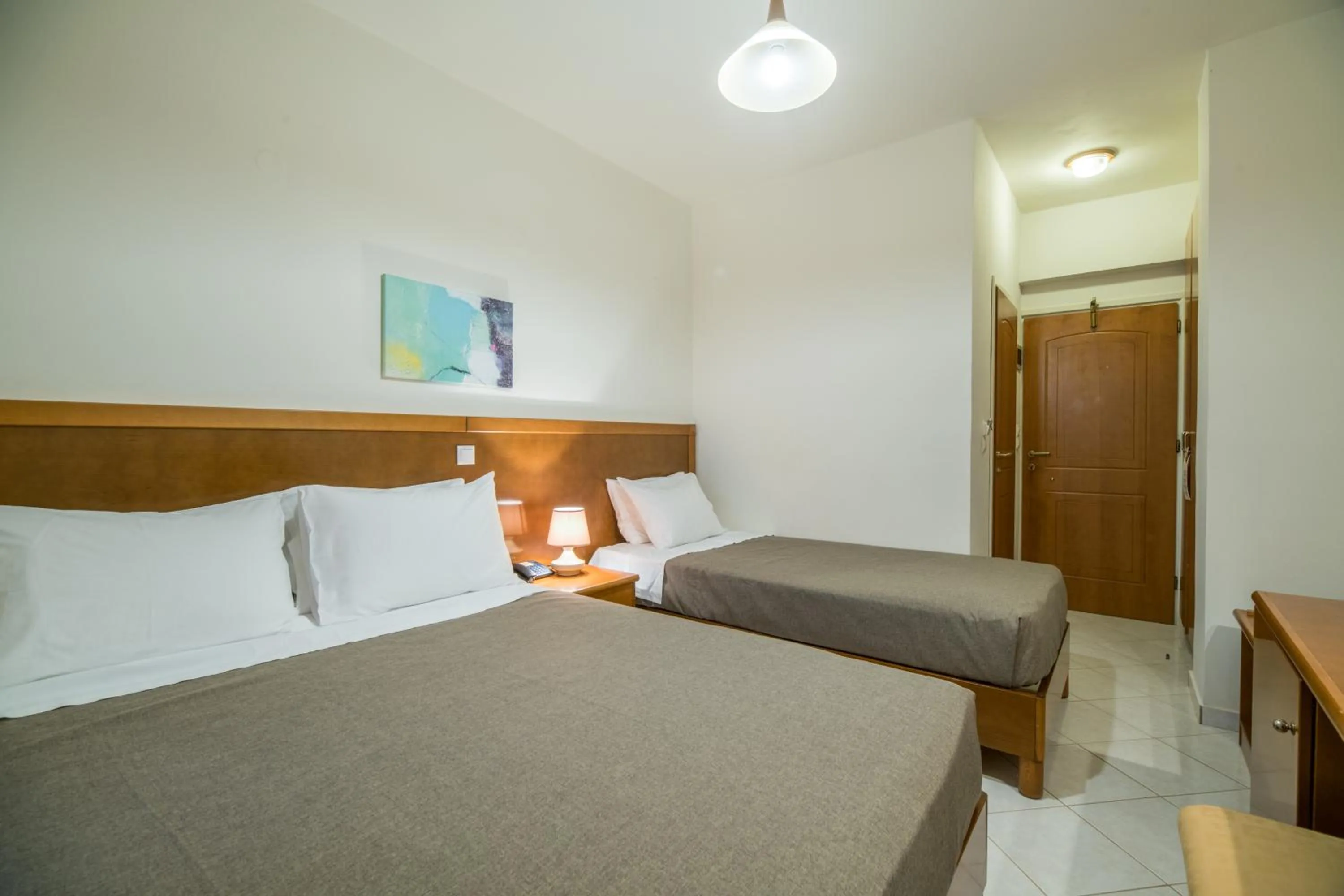 Bed in Hiona Holiday Hotel