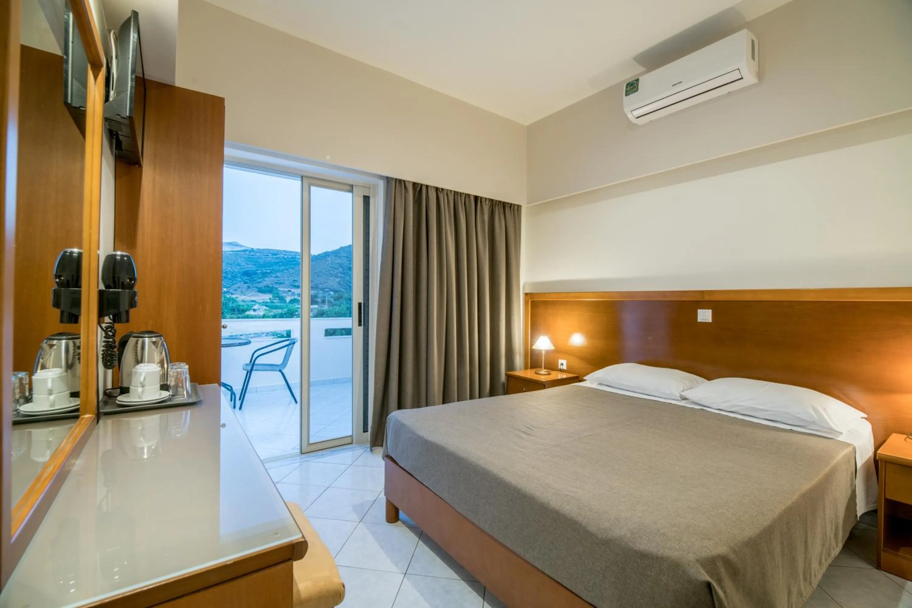 Bed in Hiona Holiday Hotel