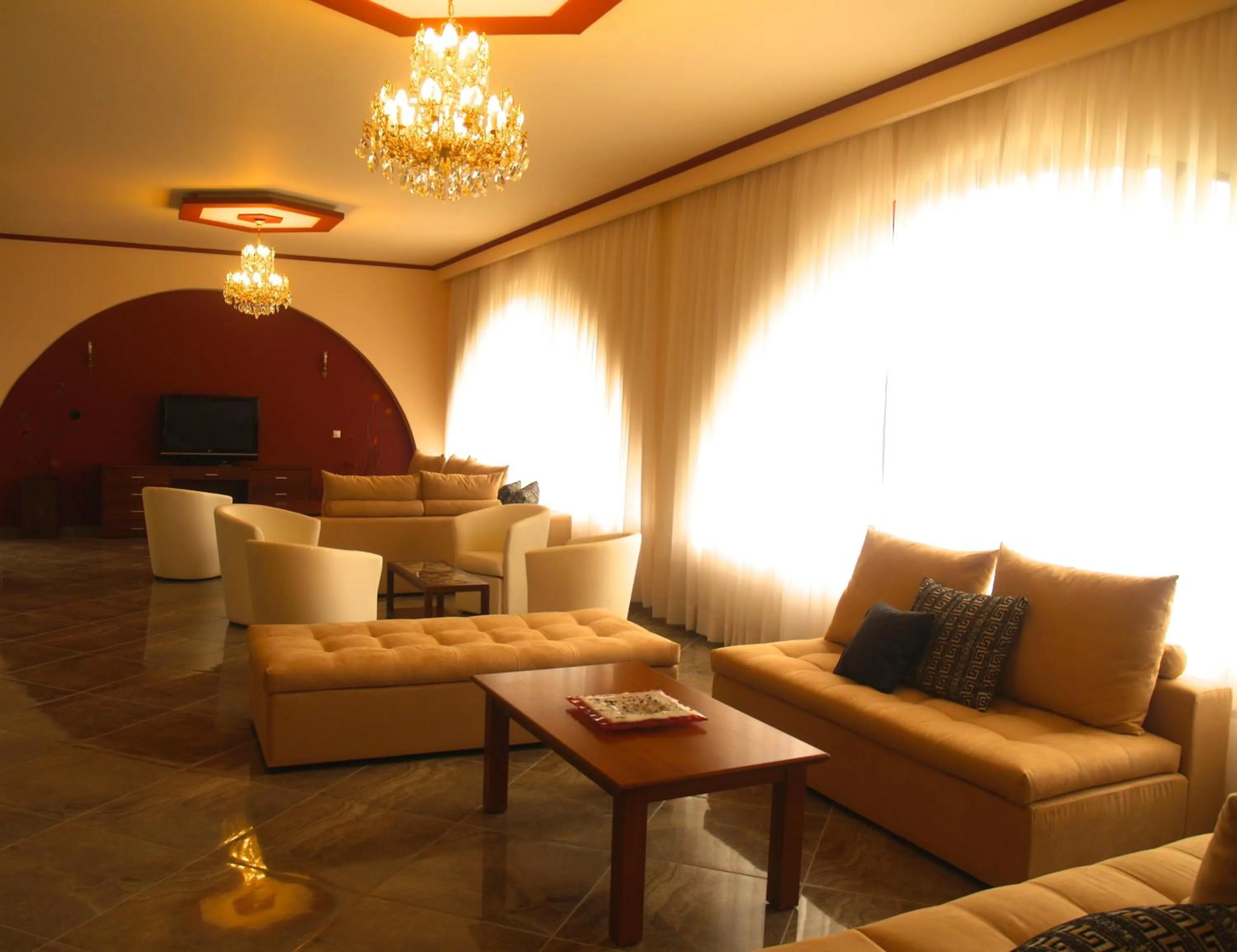 Communal lounge/ TV room in Village Mare