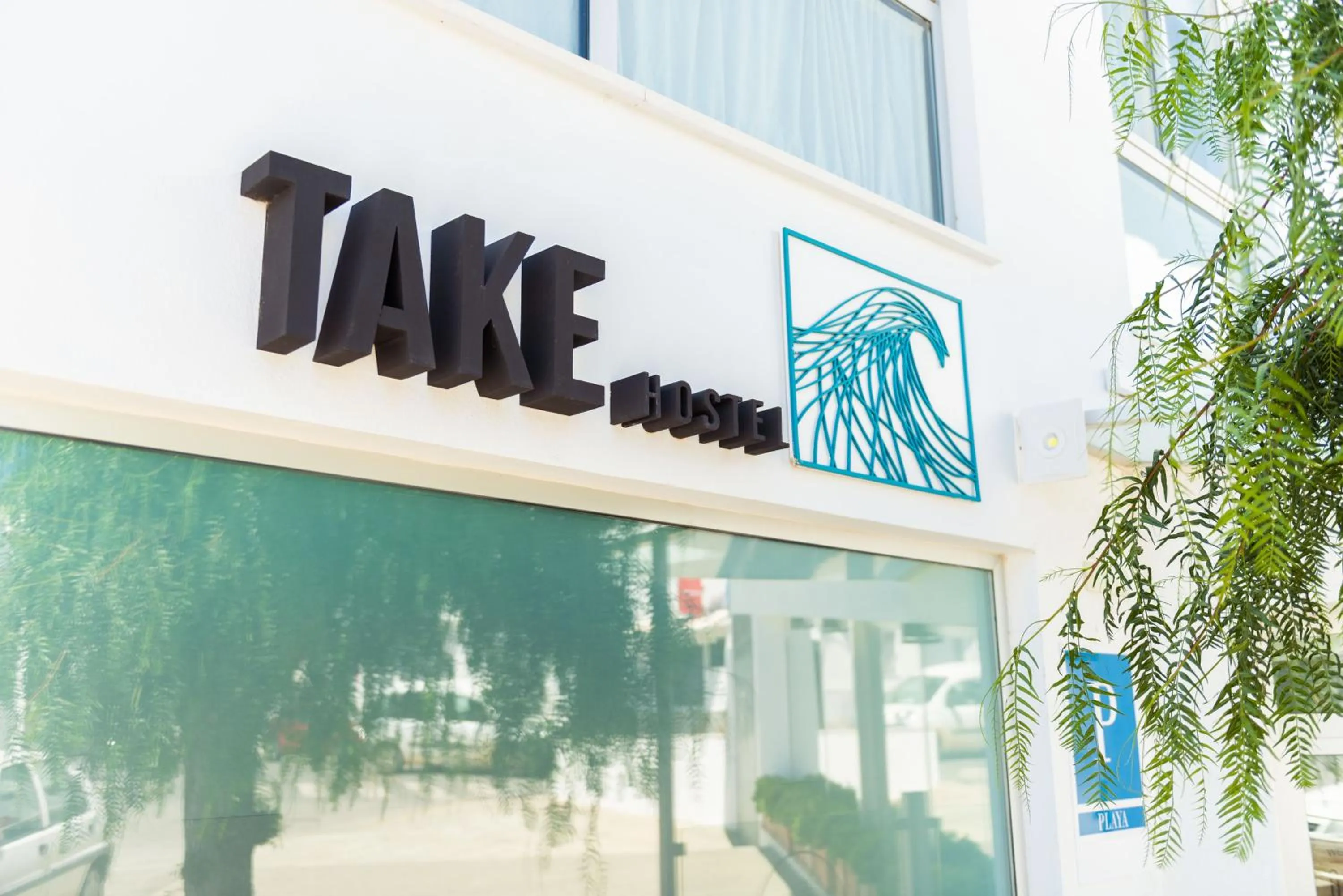 Property logo or sign in TAKE SURF Hostel Conil