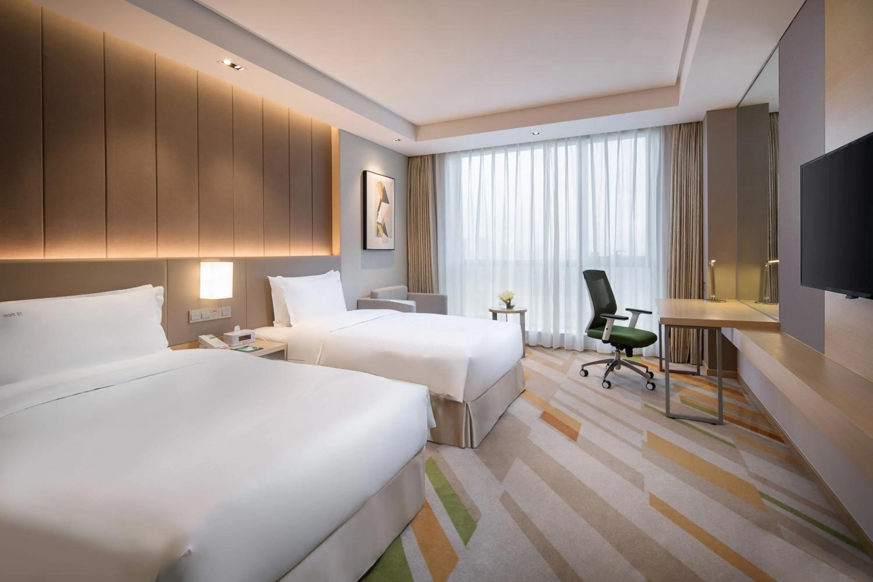 Photo of the whole room, Bed in Holiday Inn Wuxi Taihu New City by IHG