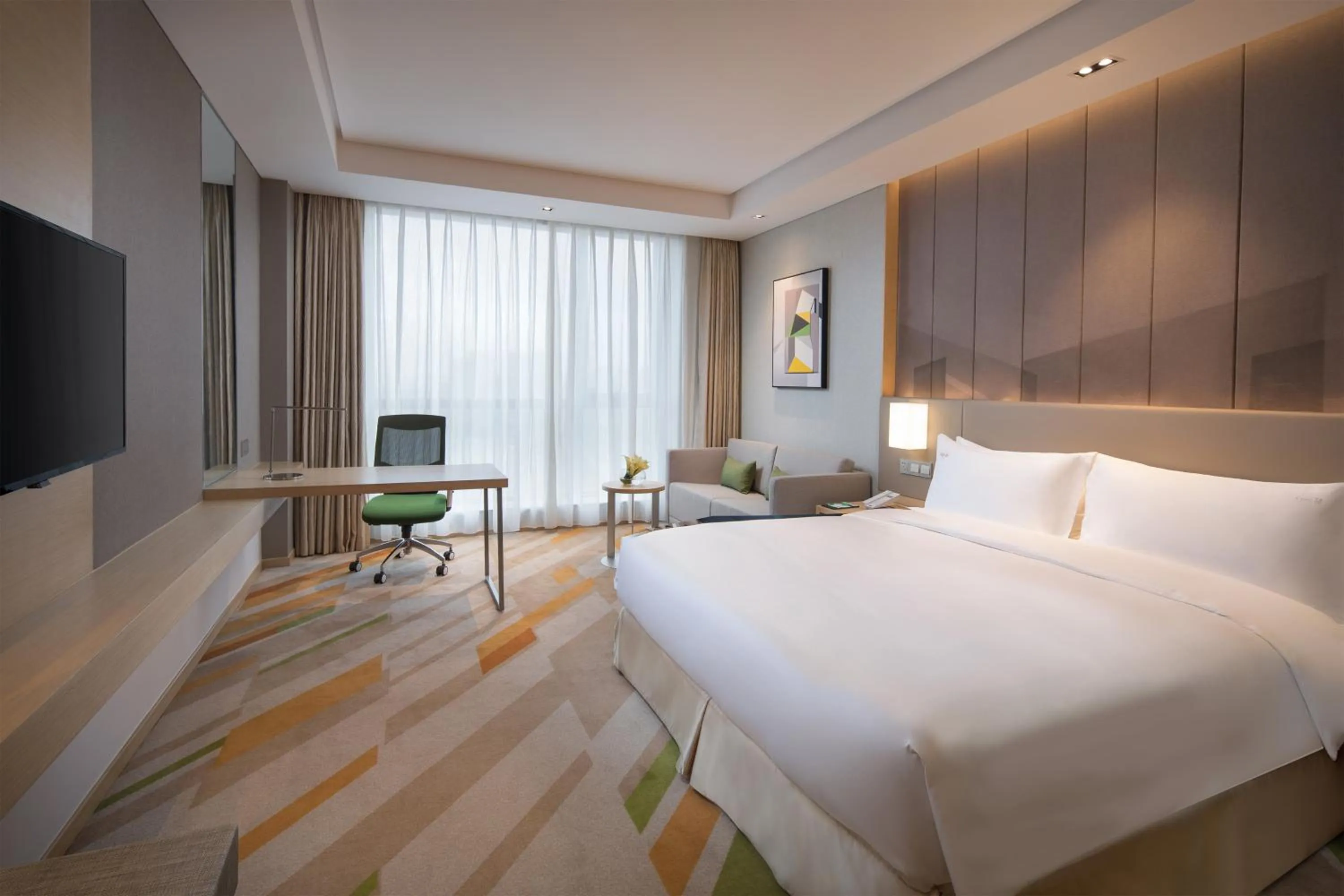 Bed in Holiday Inn Wuxi Taihu New City by IHG