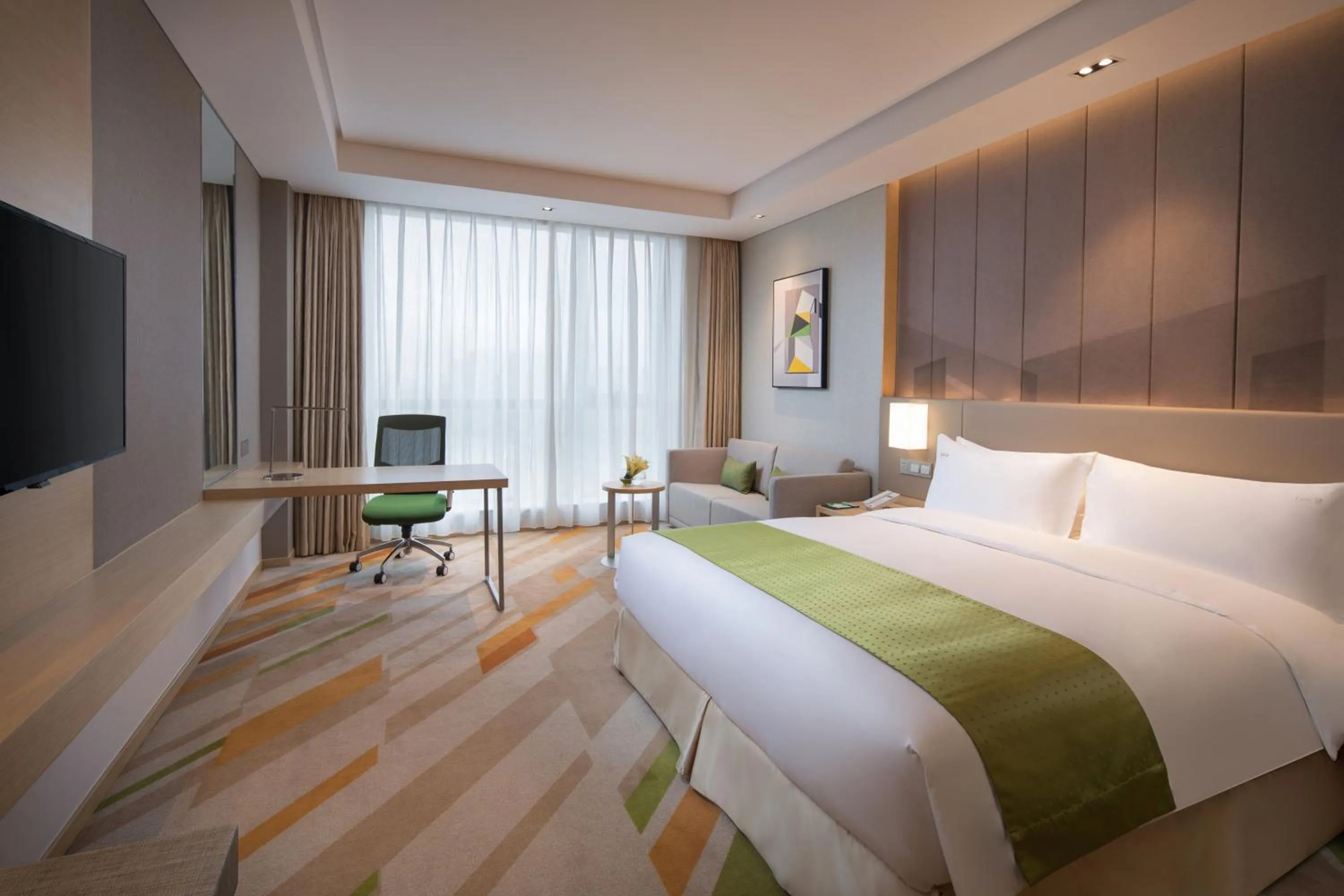 Photo of the whole room, Bed in Holiday Inn Wuxi Taihu New City by IHG