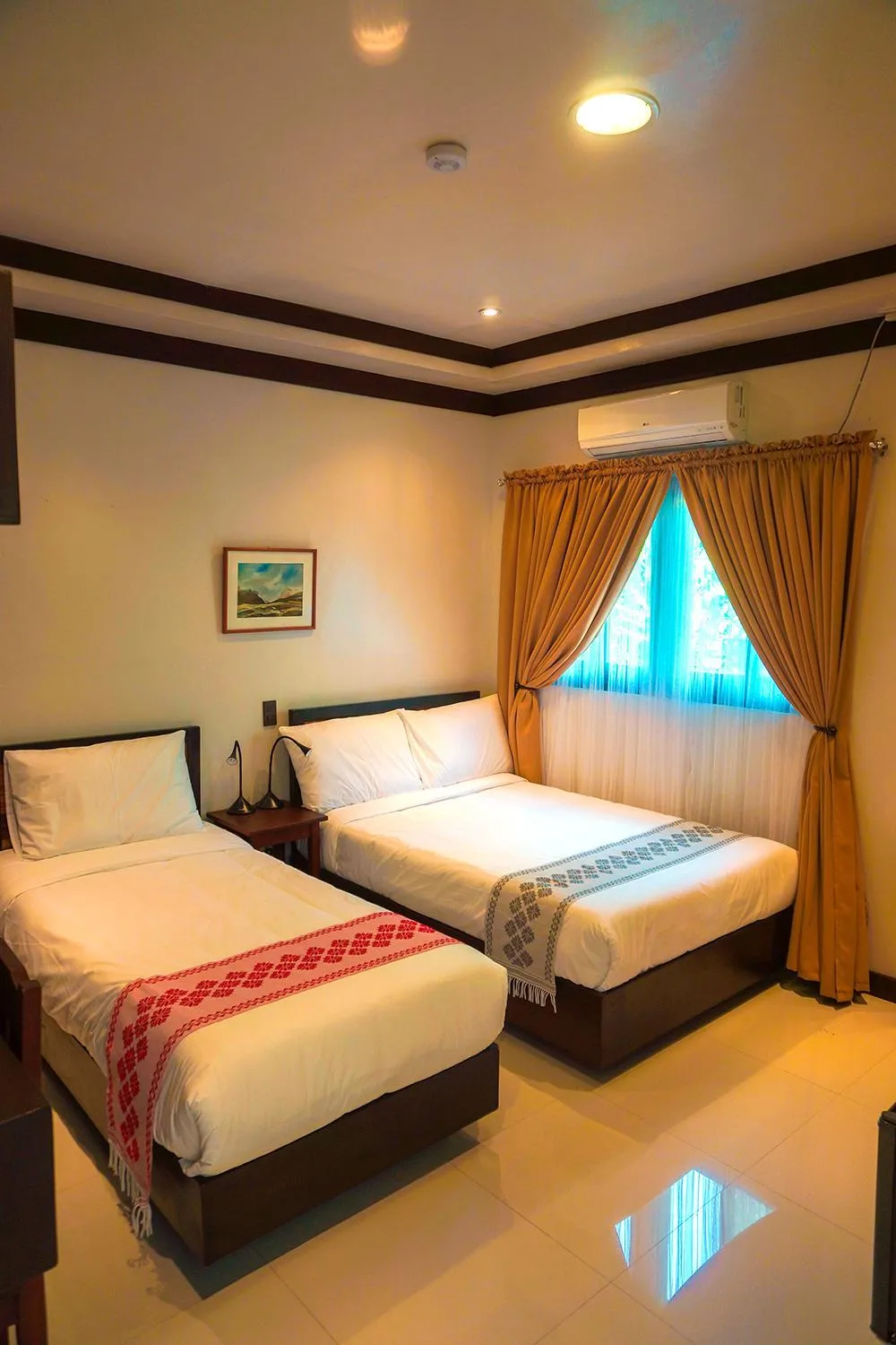 Bed in Veranda Suites and Restaurant