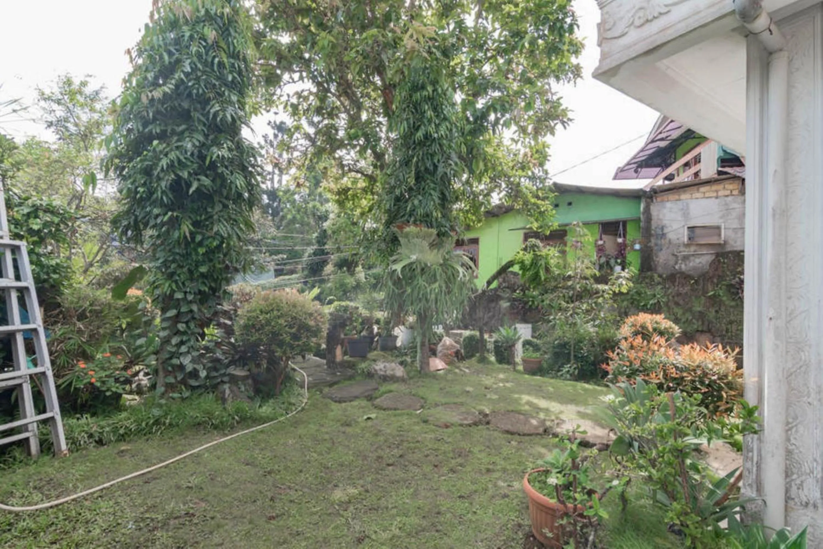 Garden in Pall Inn Puncak Mitra RedDoorz