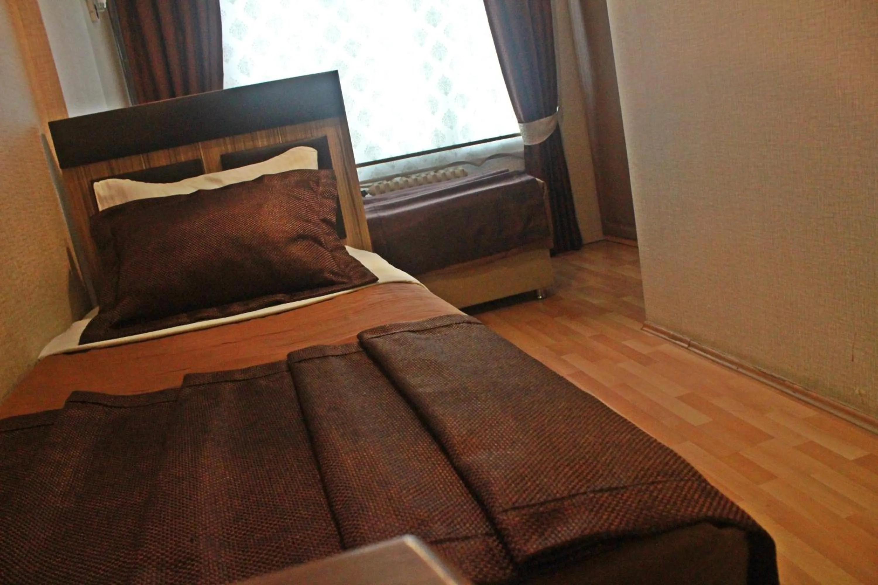 Bed in Cmr Aydogan Hotel