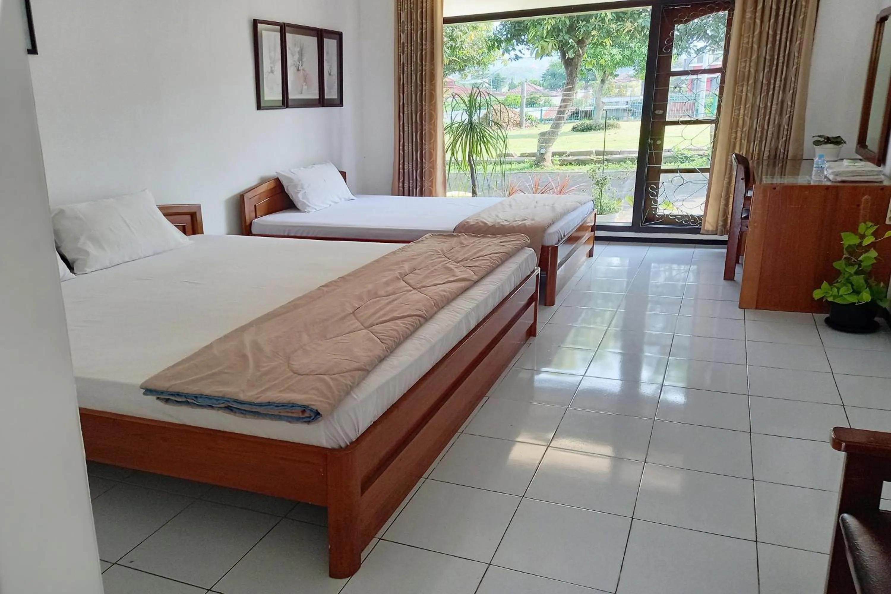 Bed in Vanda Villa Batu