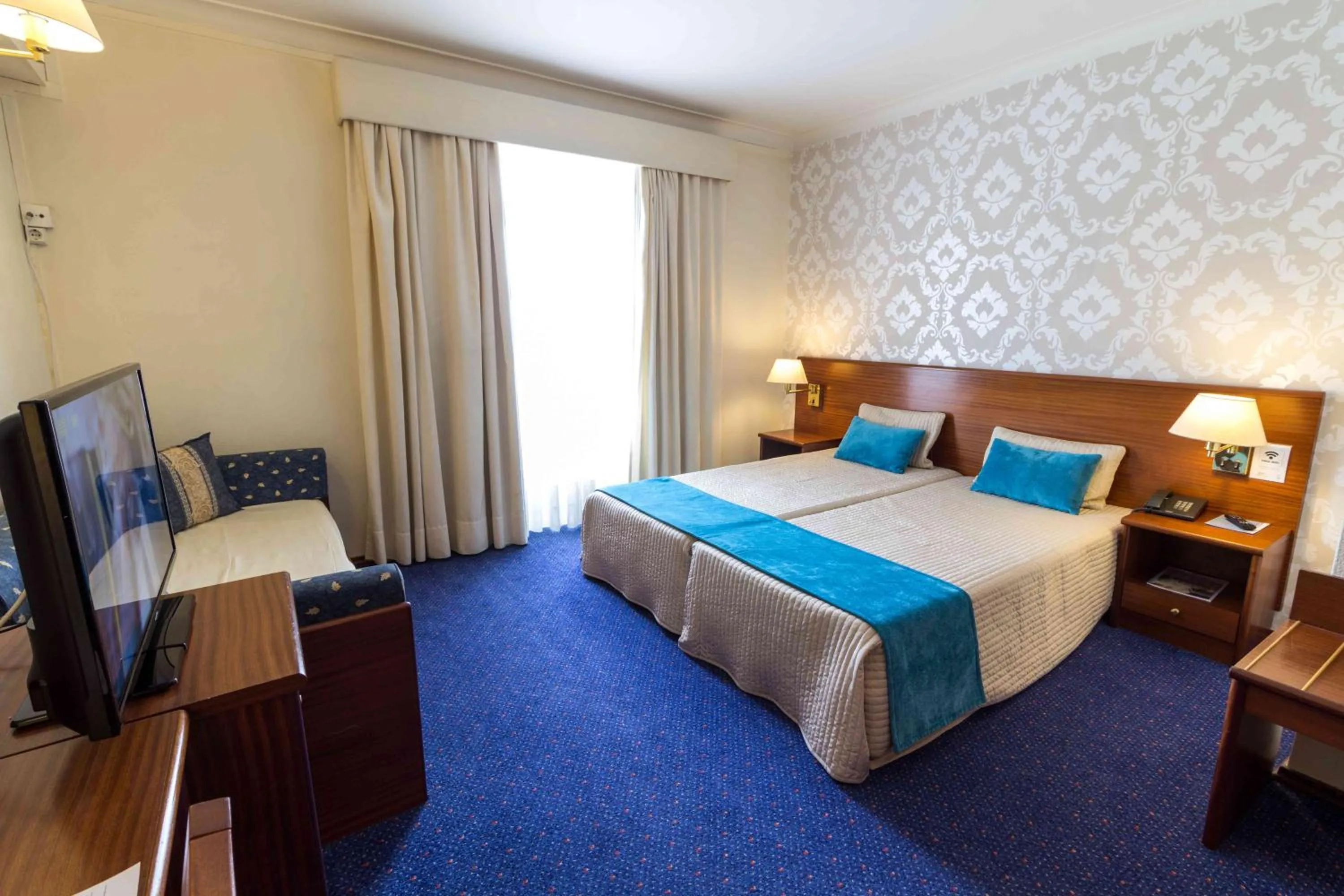 Bed in Hotel Eurosol Gouveia