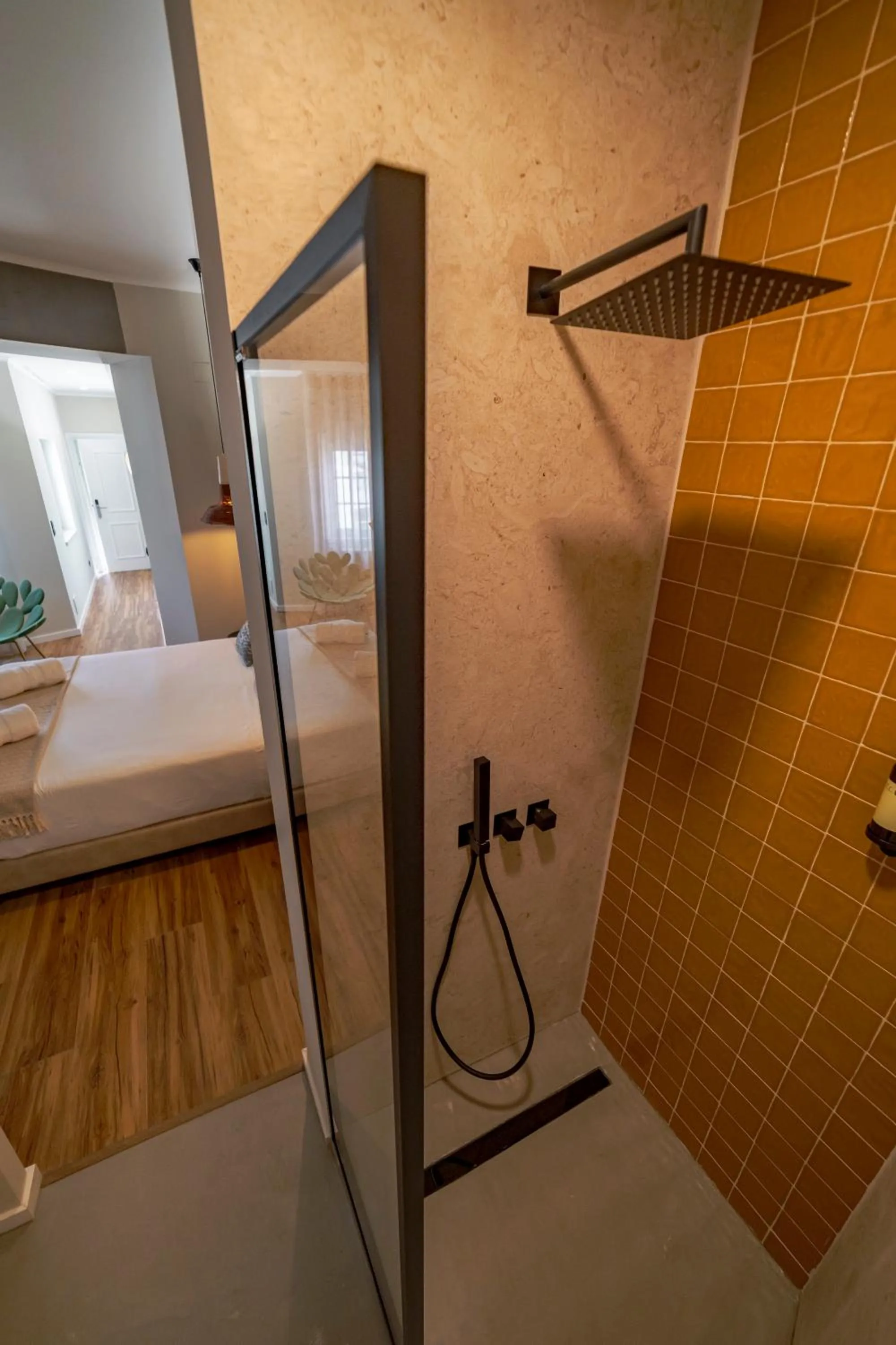 Shower, Bed in 19 Tile Ceramic Concept - by Unlock Hotels
