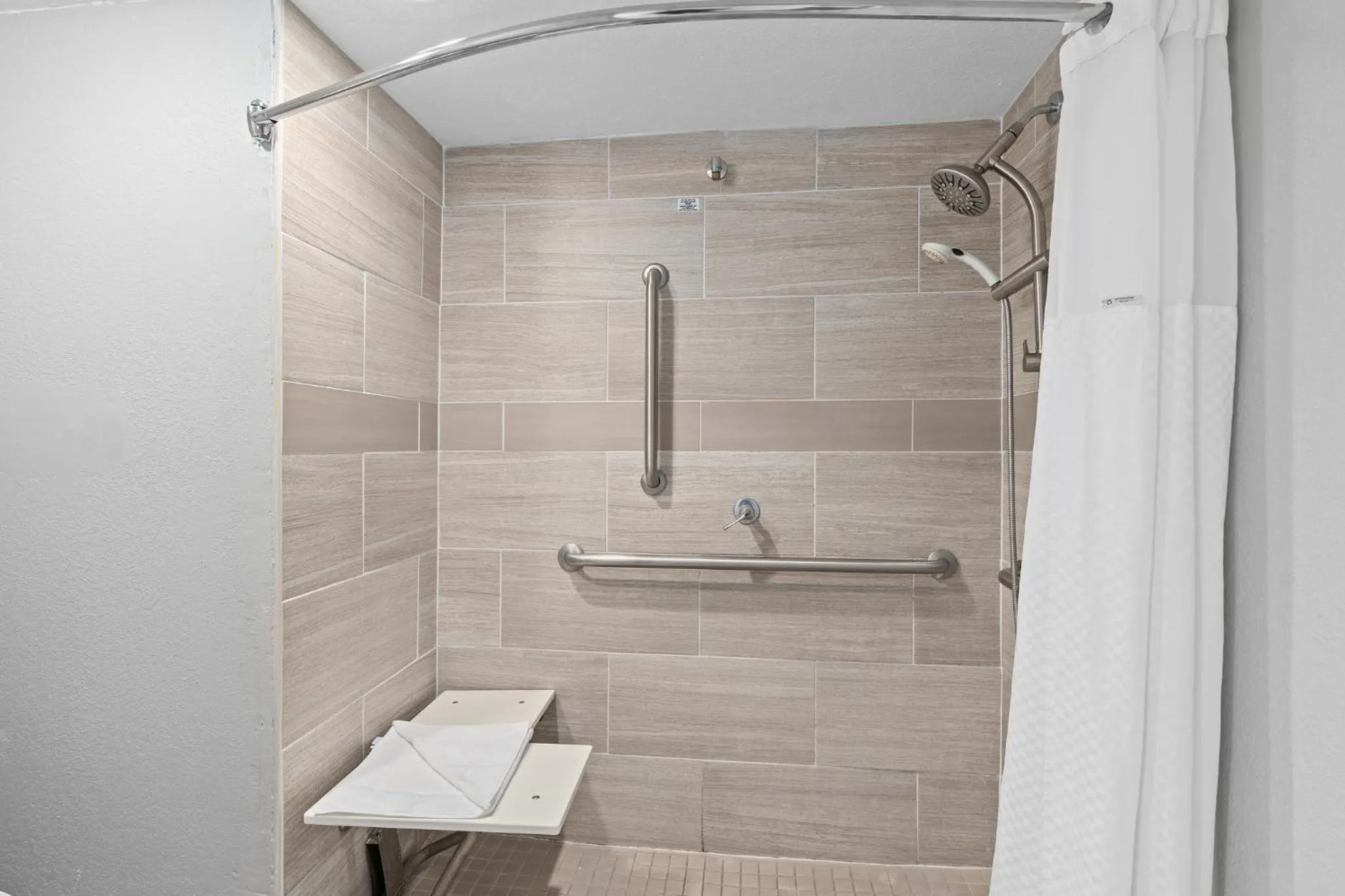 Shower in Baymont by Wyndham Orlando East