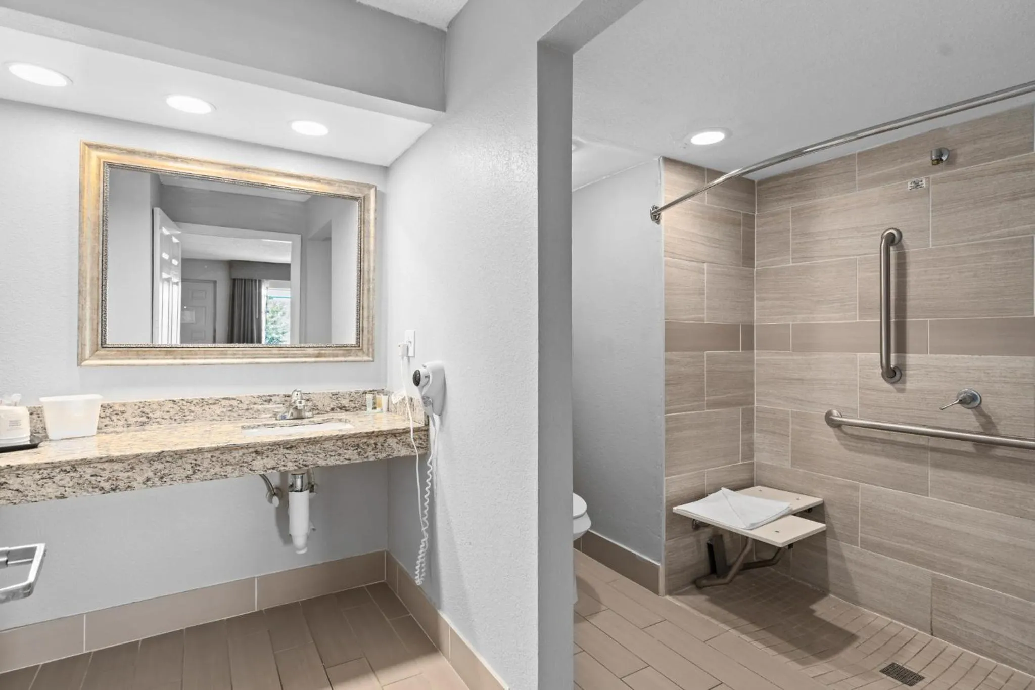 Shower in Baymont by Wyndham Orlando East