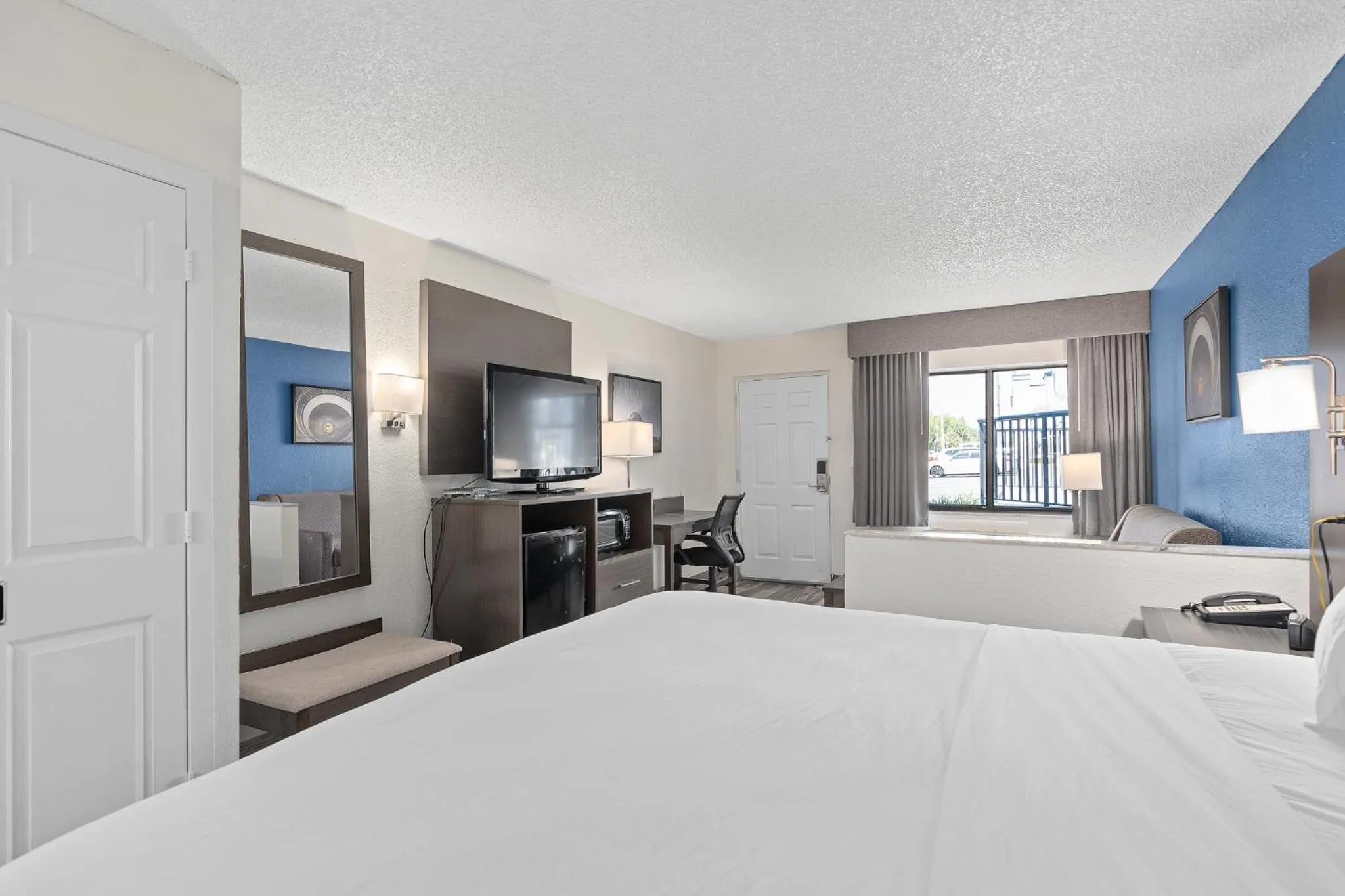 Bed in Baymont by Wyndham Orlando East