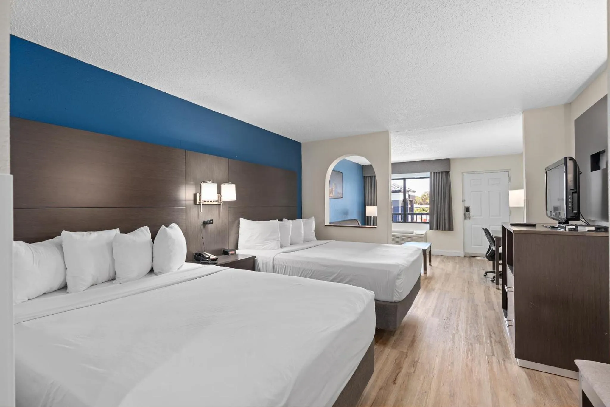Bed in Baymont by Wyndham Orlando East