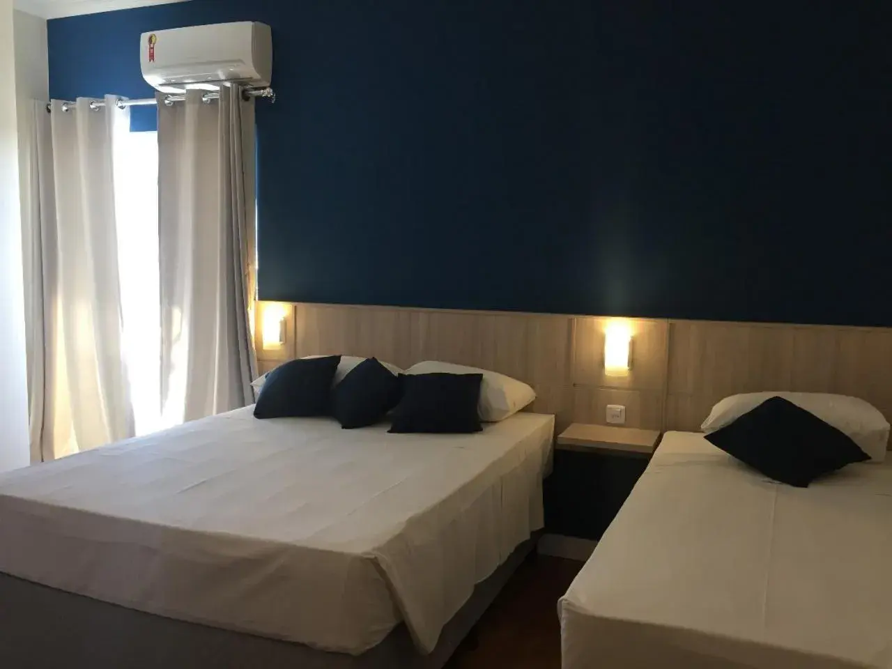 Standard Triple Room - single occupancy in Sense Hotel Araucária Standard Triple Room - single occupancy in Sense Hotel Araucária