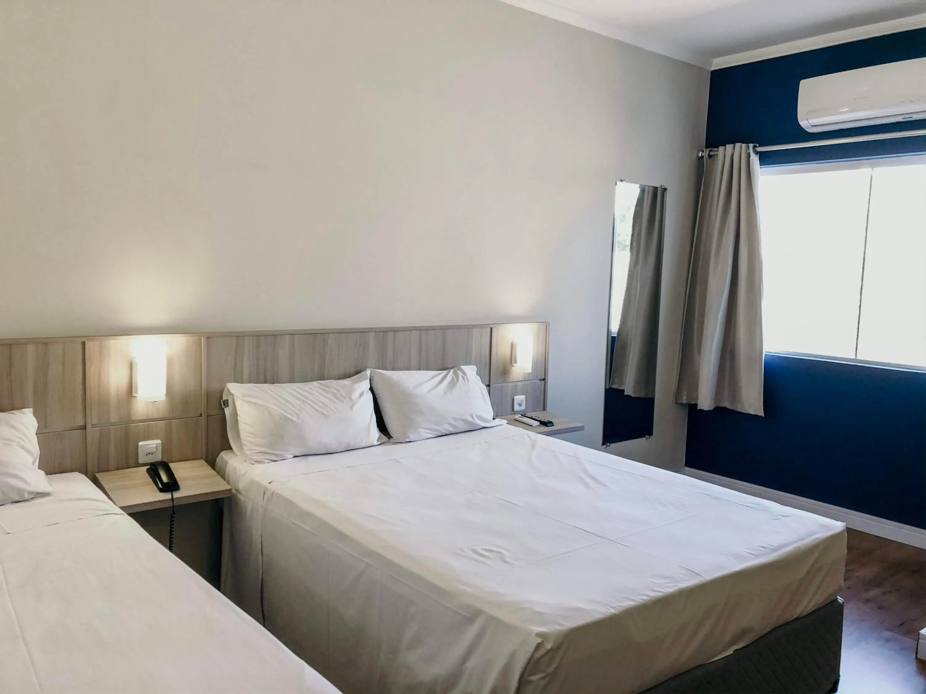 Photo of the whole room, Bed in Sense Hotel Araucária