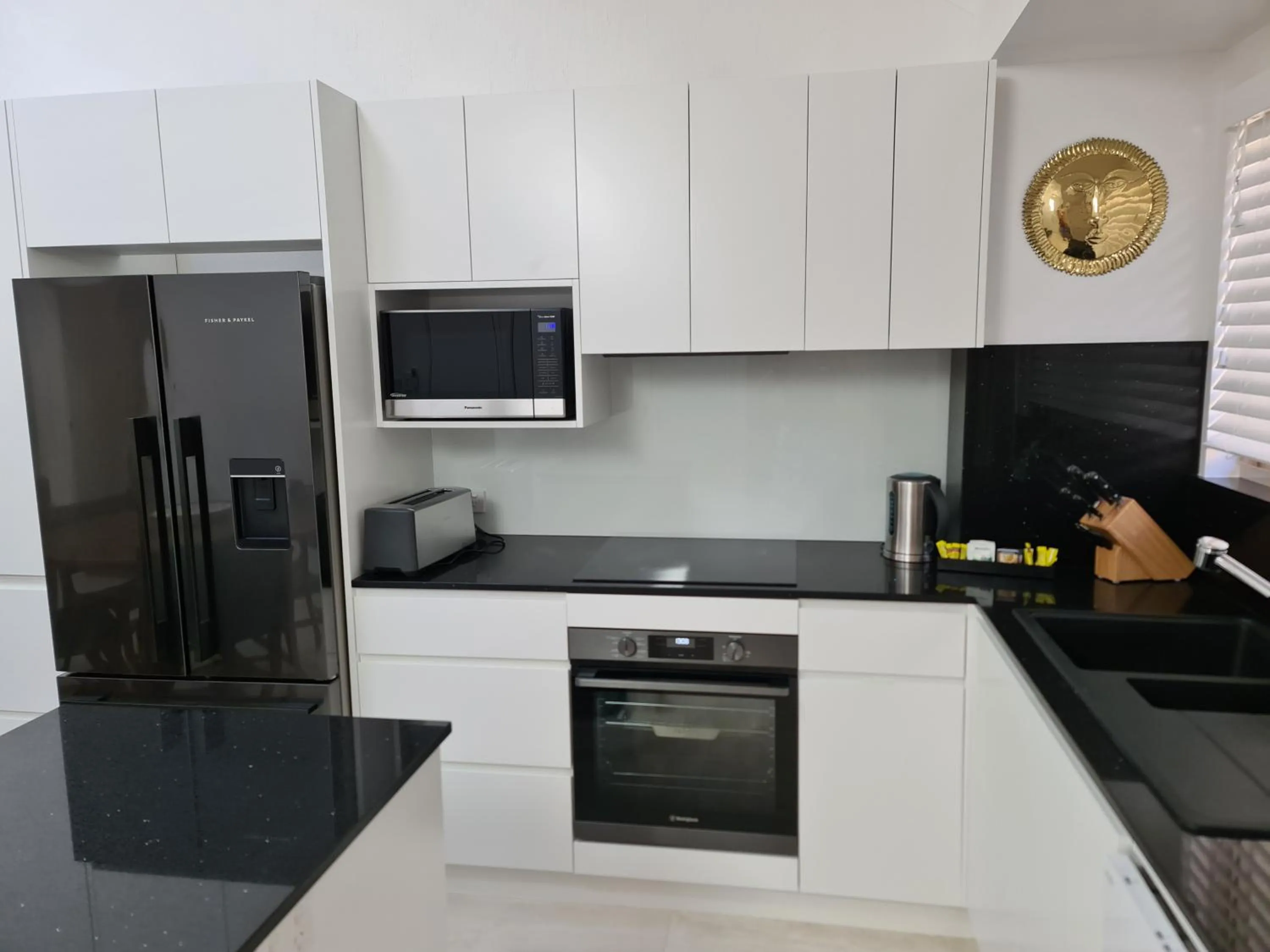 Kitchen or kitchenette in The Islander Noosa Resort