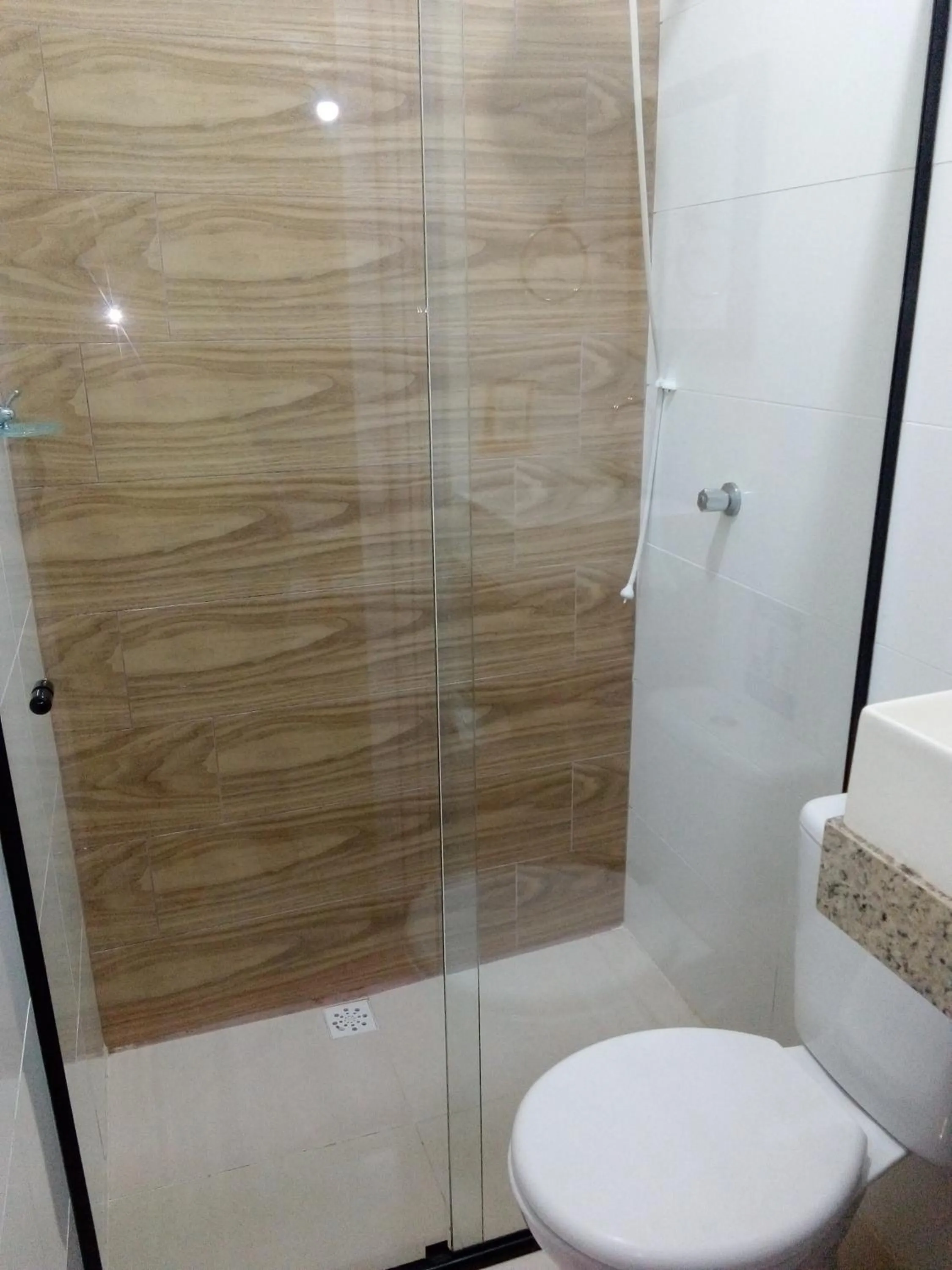 Bathroom in Pousada Reis Guarujá