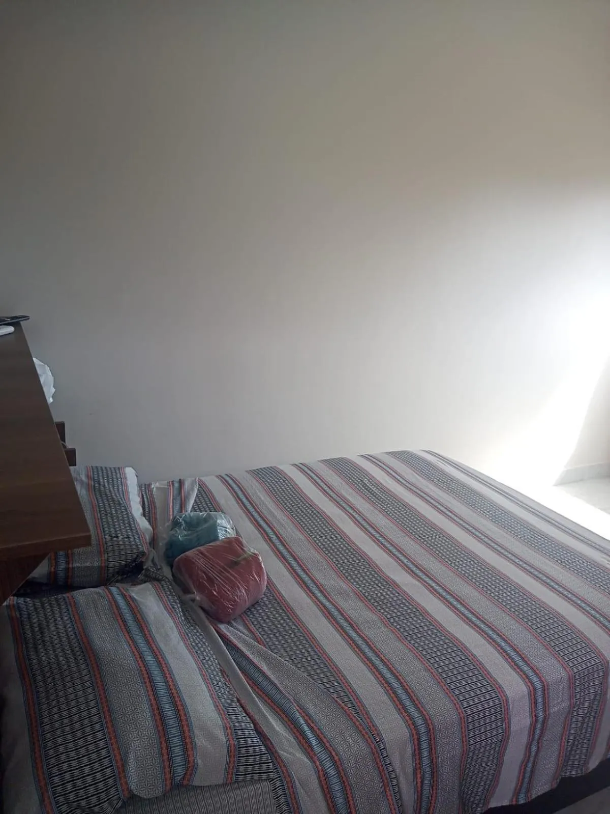 Bed in Pousada Reis Guarujá