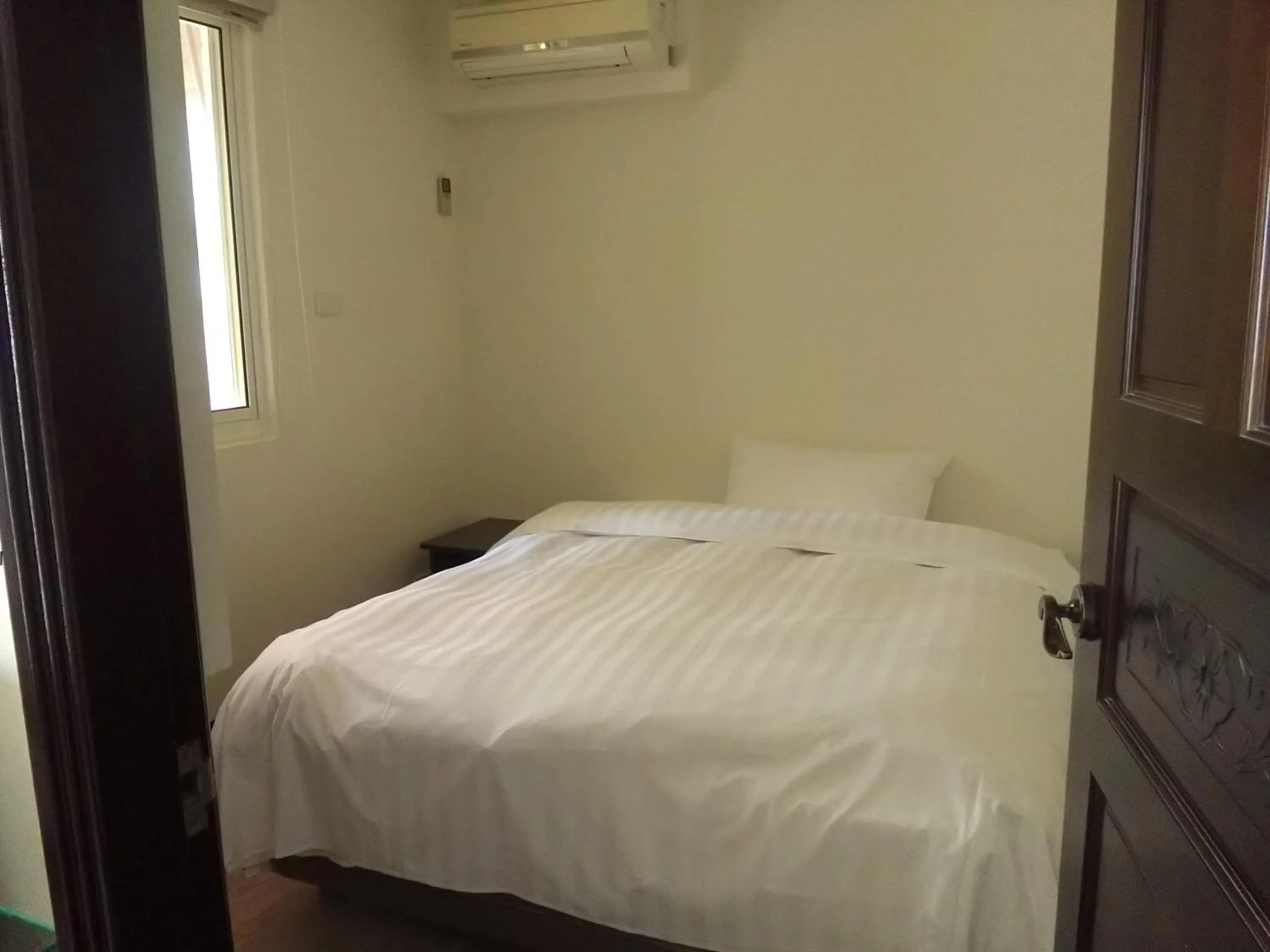 Bed in Dengfeng Milan Business Hotel