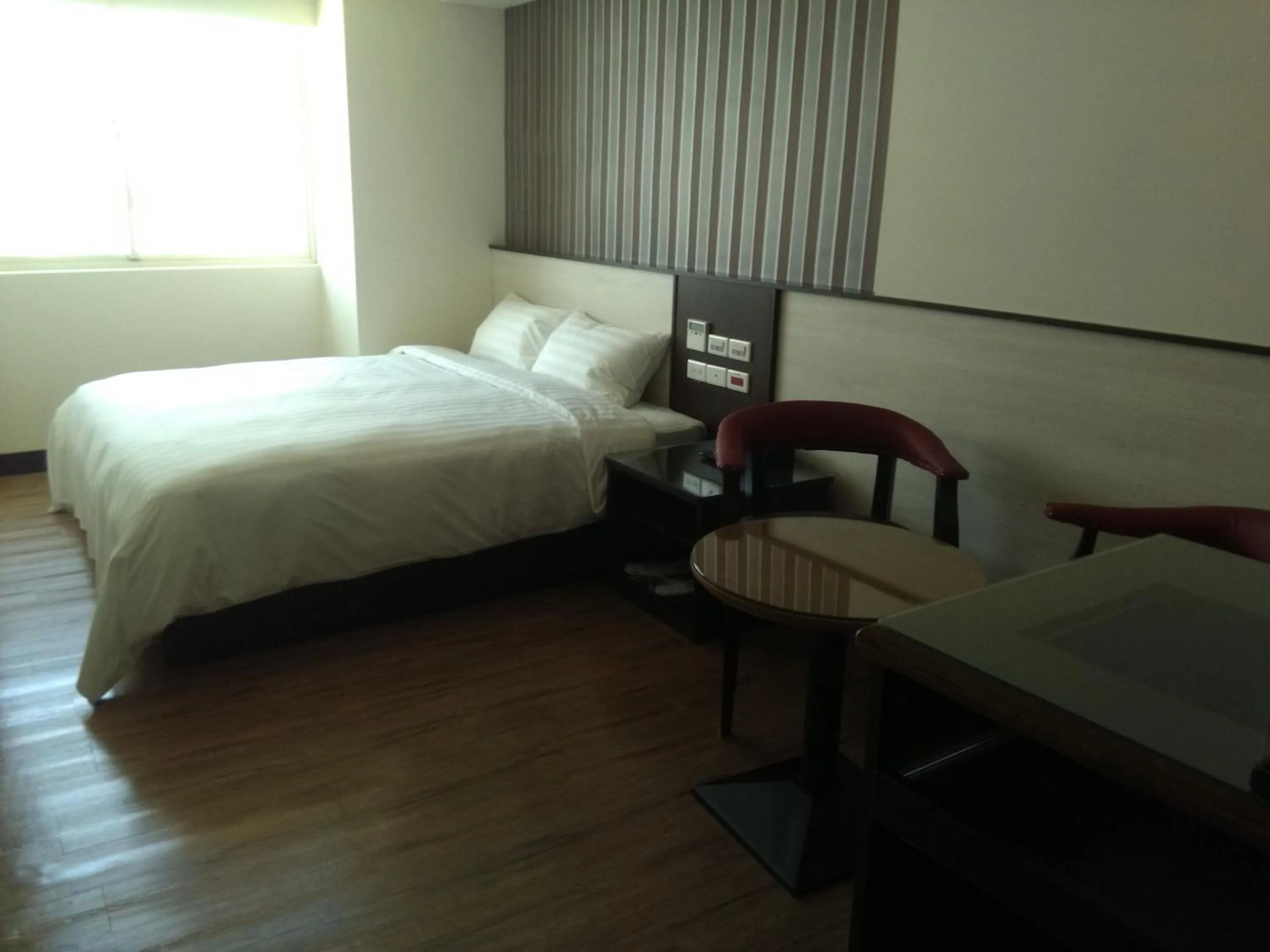 Bed in Dengfeng Milan Business Hotel