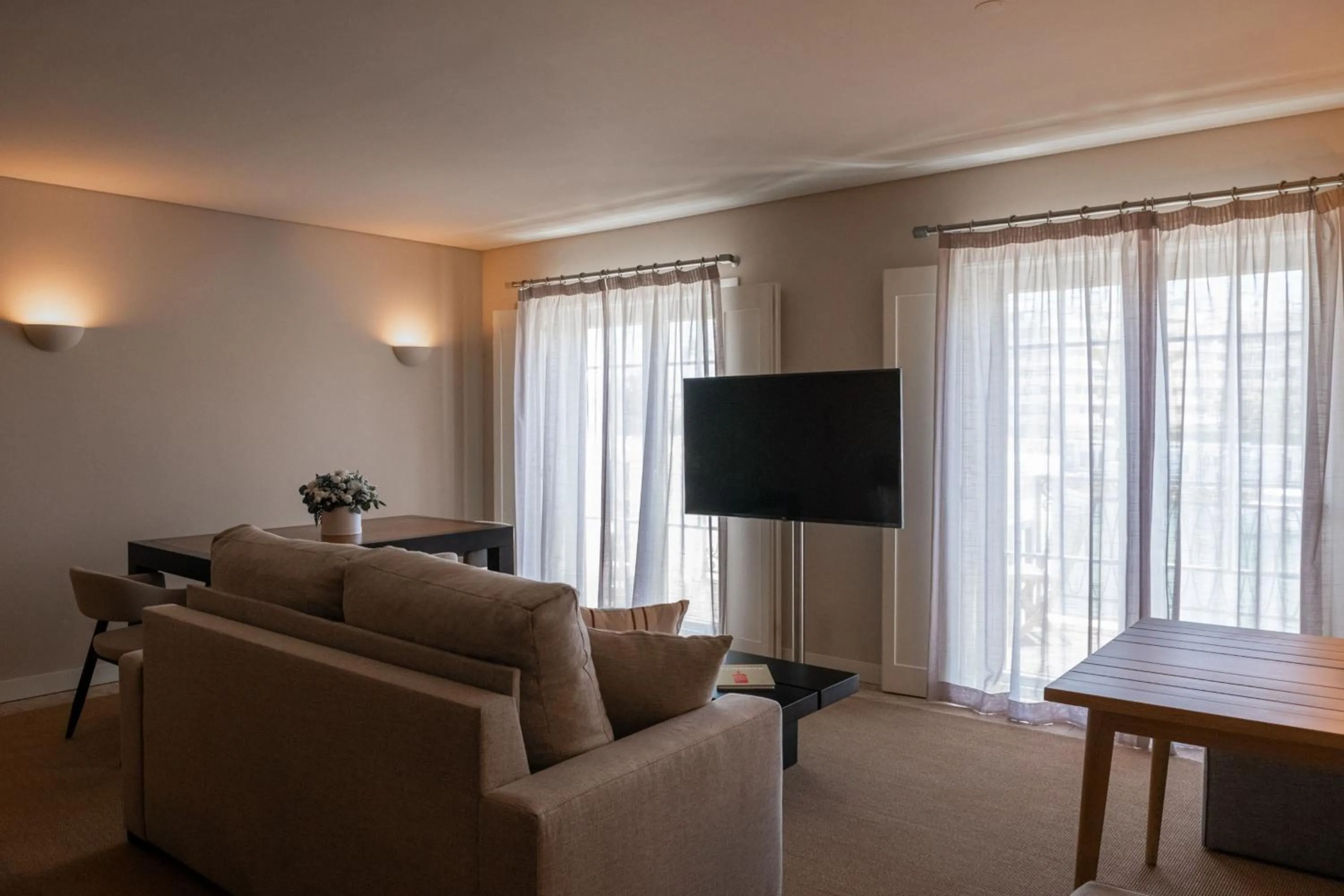 Living room in Domes Lake Algarve, Autograph Collection