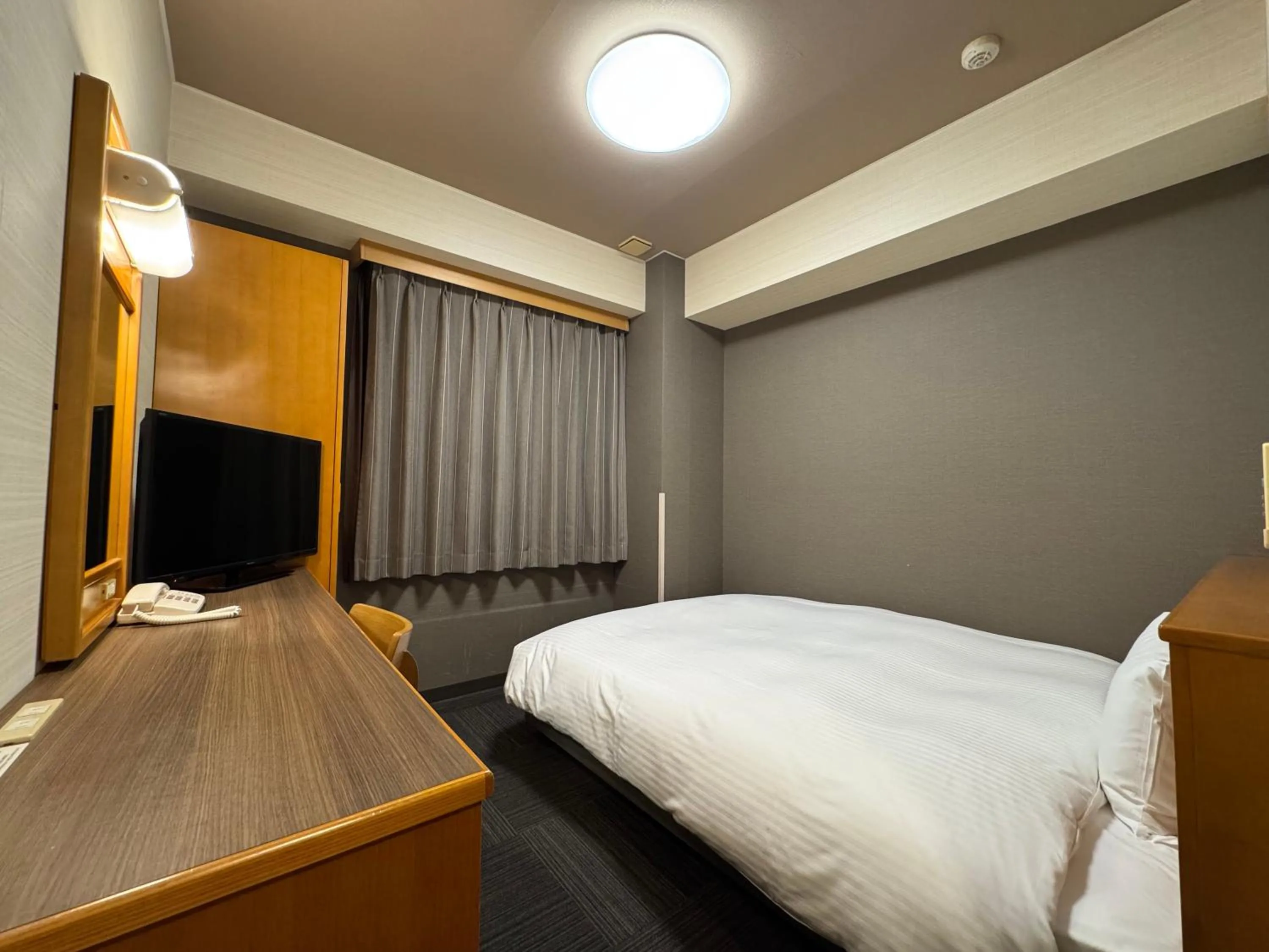Photo of the whole room, Bed in Hotel Route-Inn Nakatsugawa Inter