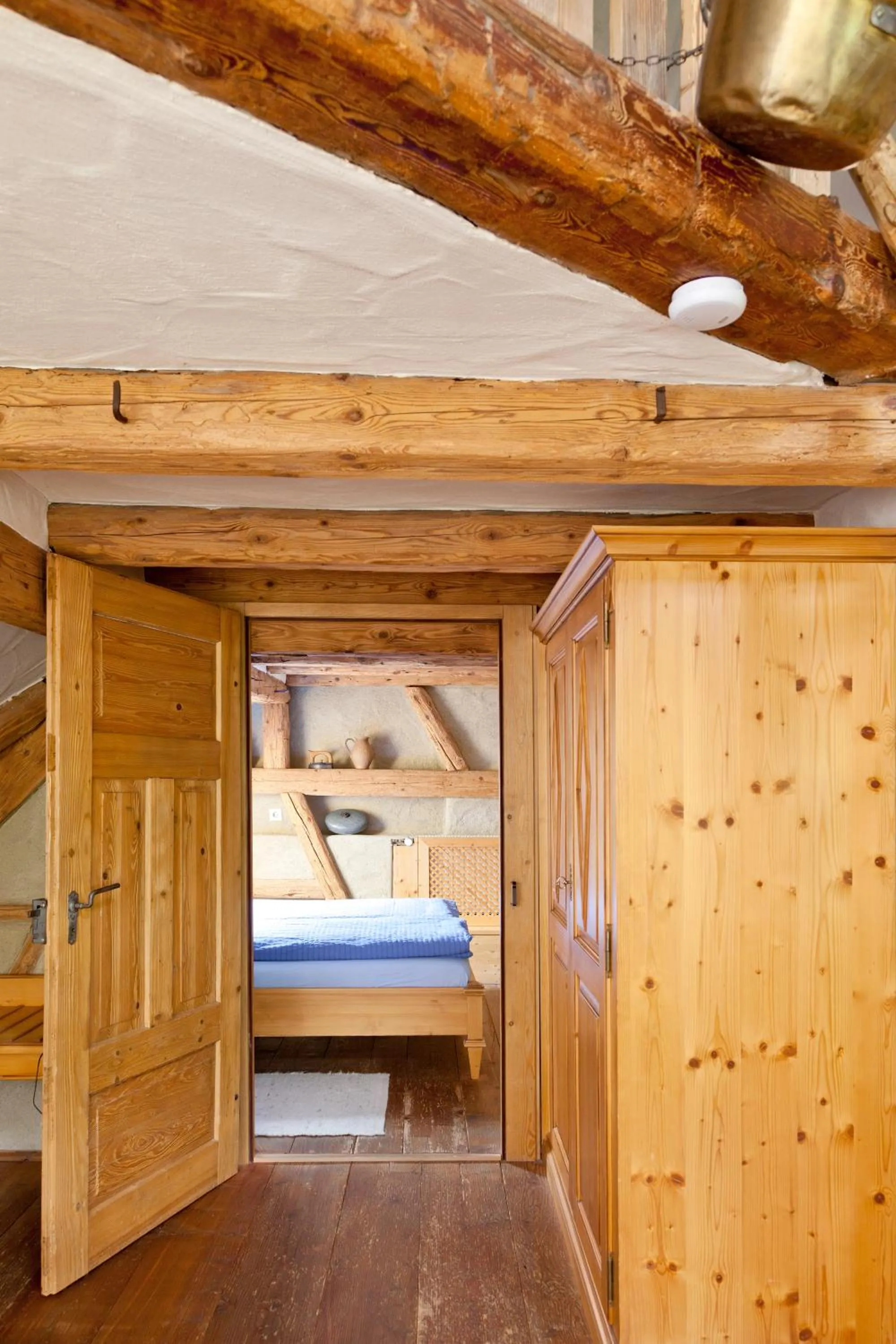 Bedroom in Naturhotel Holzwurm