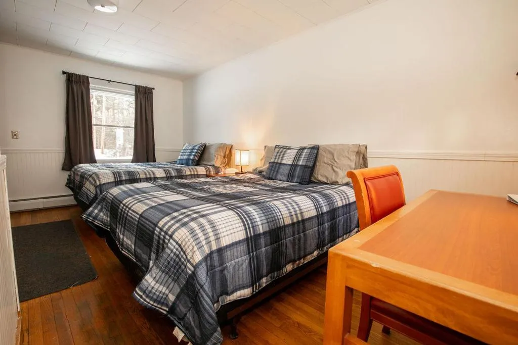 Bed in West Bethel Motel