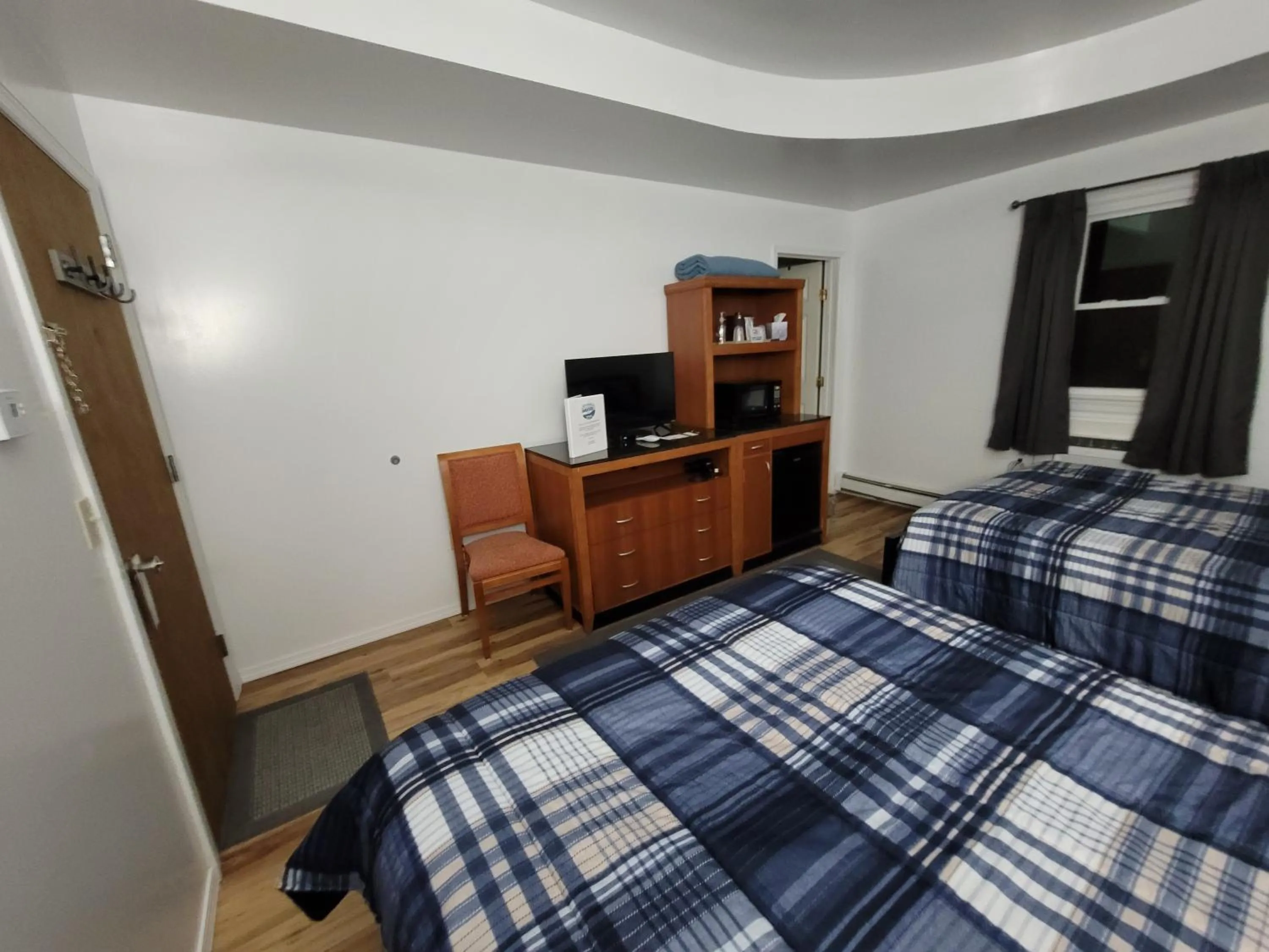 Bed in West Bethel Motel