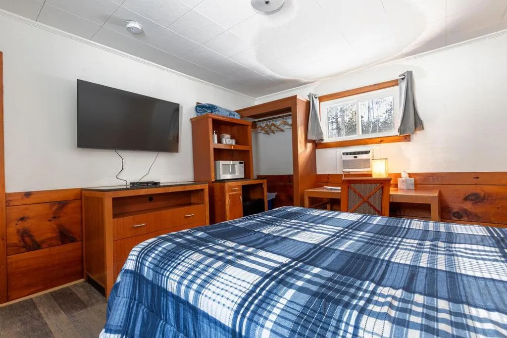 Bed in West Bethel Motel