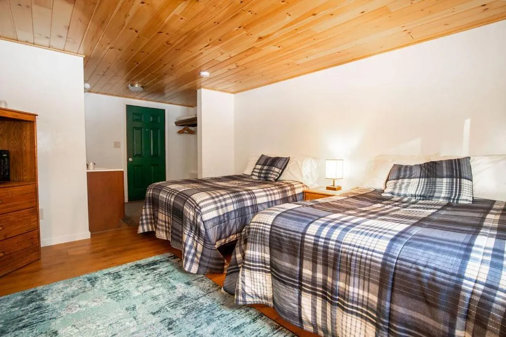 Bed in West Bethel Motel