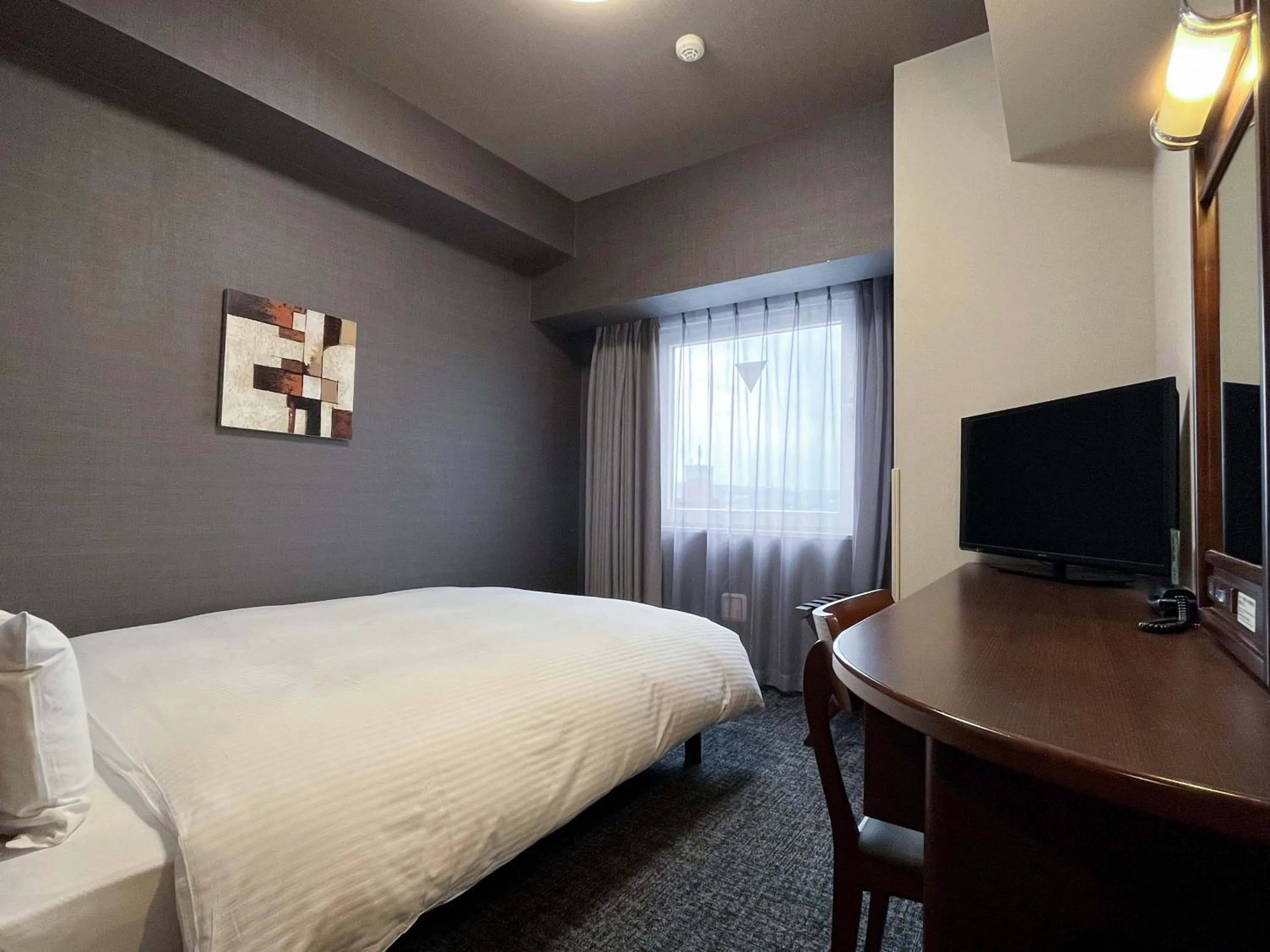 Photo of the whole room, Bed in Hotel Route-Inn Toki