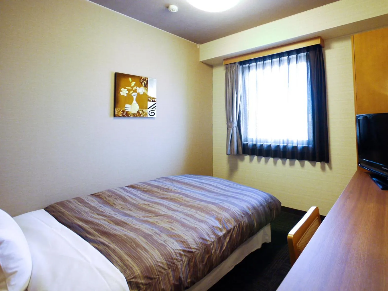Bed in Hotel Route-Inn Tajimi Inter