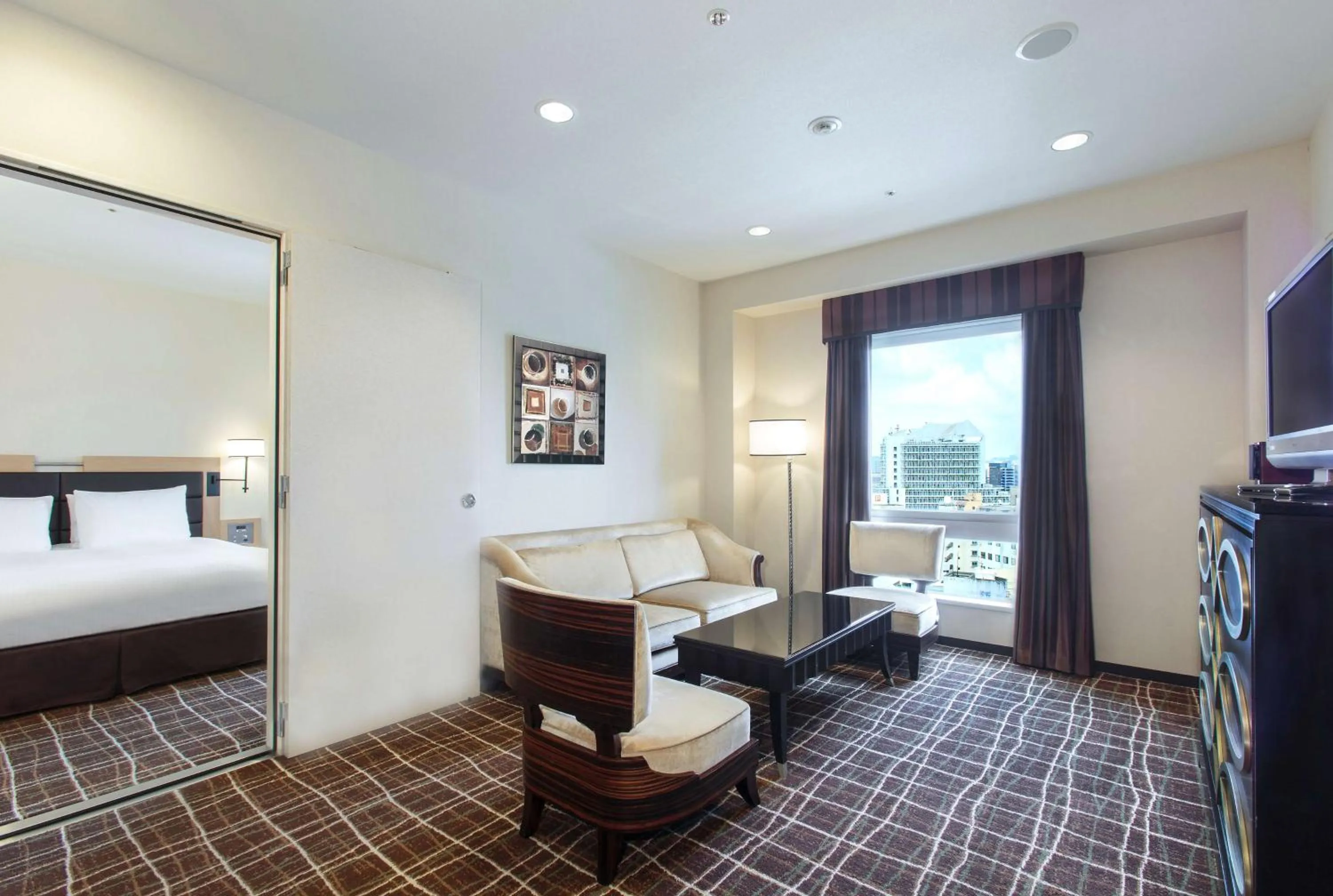 Living room, Bed in DoubleTree by Hilton Naha