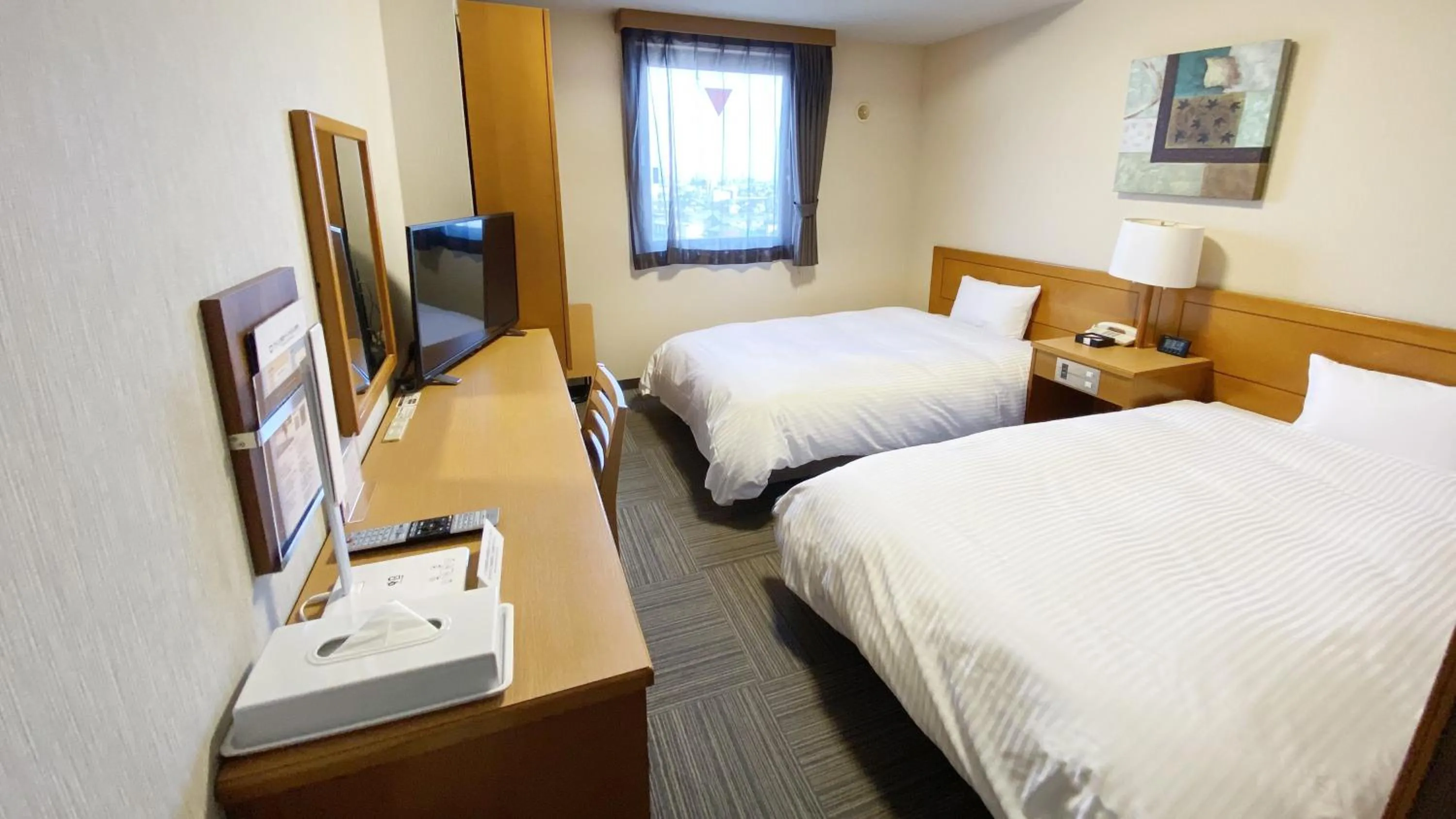 Photo of the whole room, Bed in Hotel Route-Inn Yokkaichi