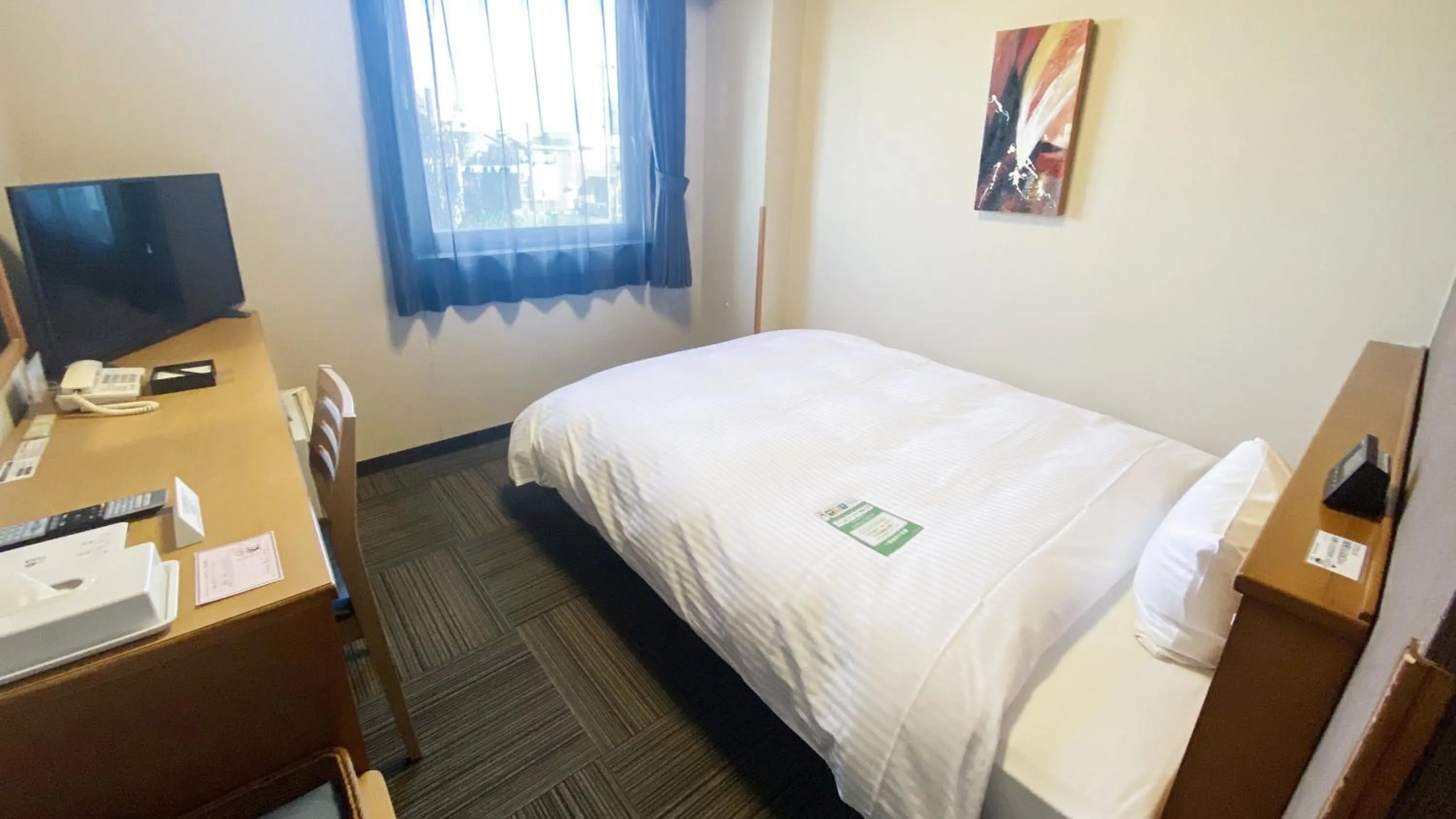 Photo of the whole room, Bed in Hotel Route-Inn Yokkaichi