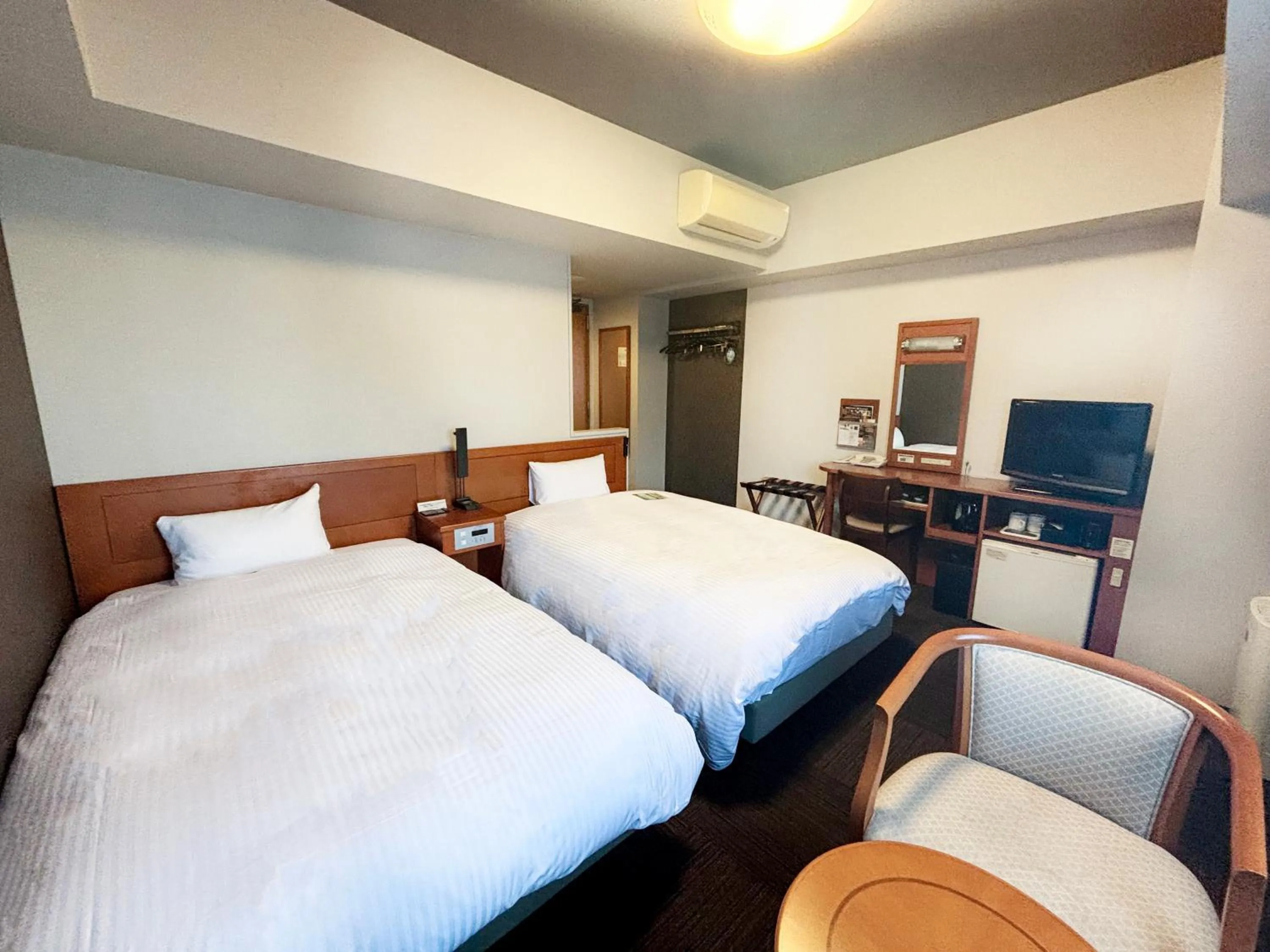 Photo of the whole room, Bed in Hotel Route-Inn Suzuka