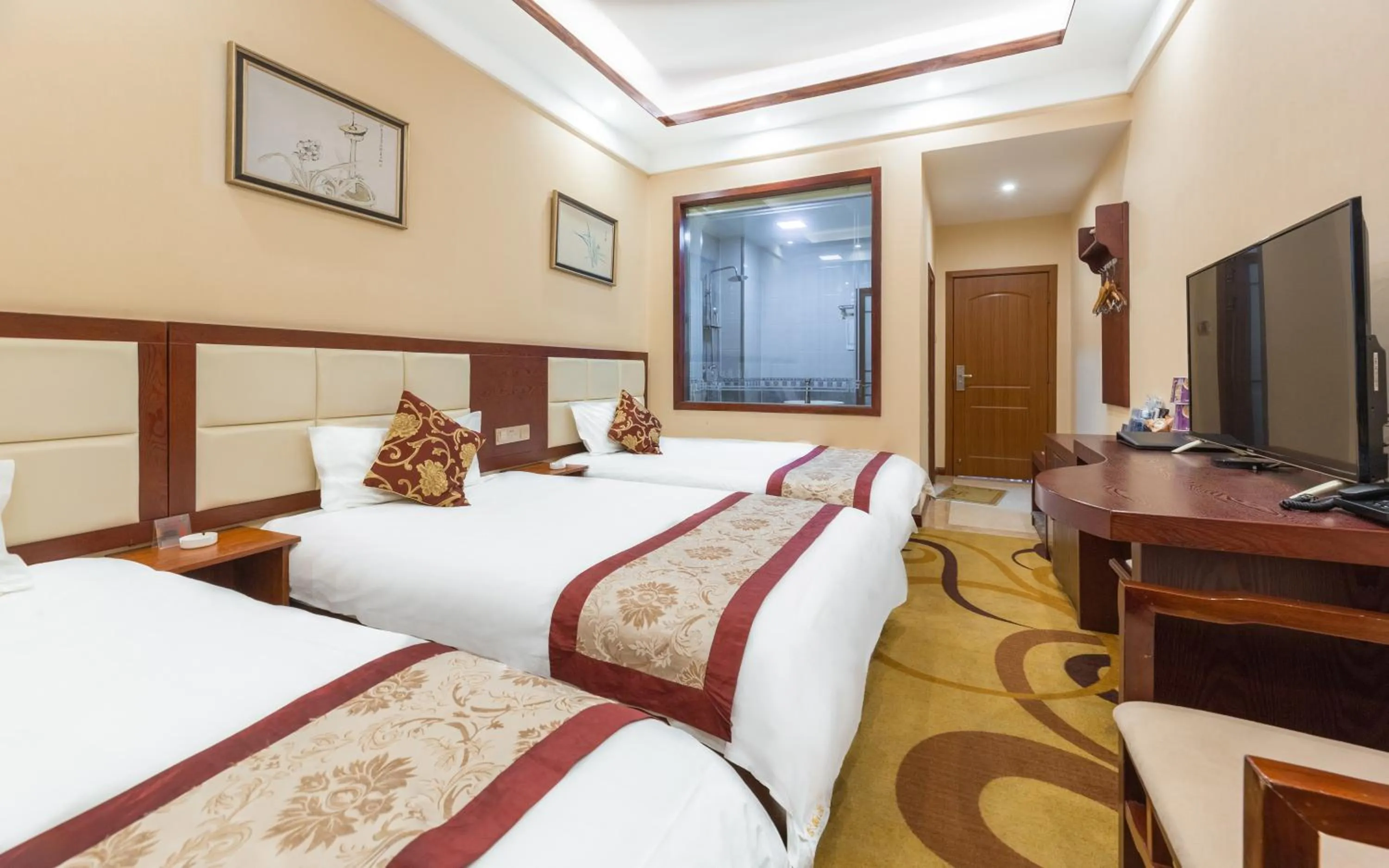 Photo of the whole room, Bed in Binchuan Shuang Long Hotel