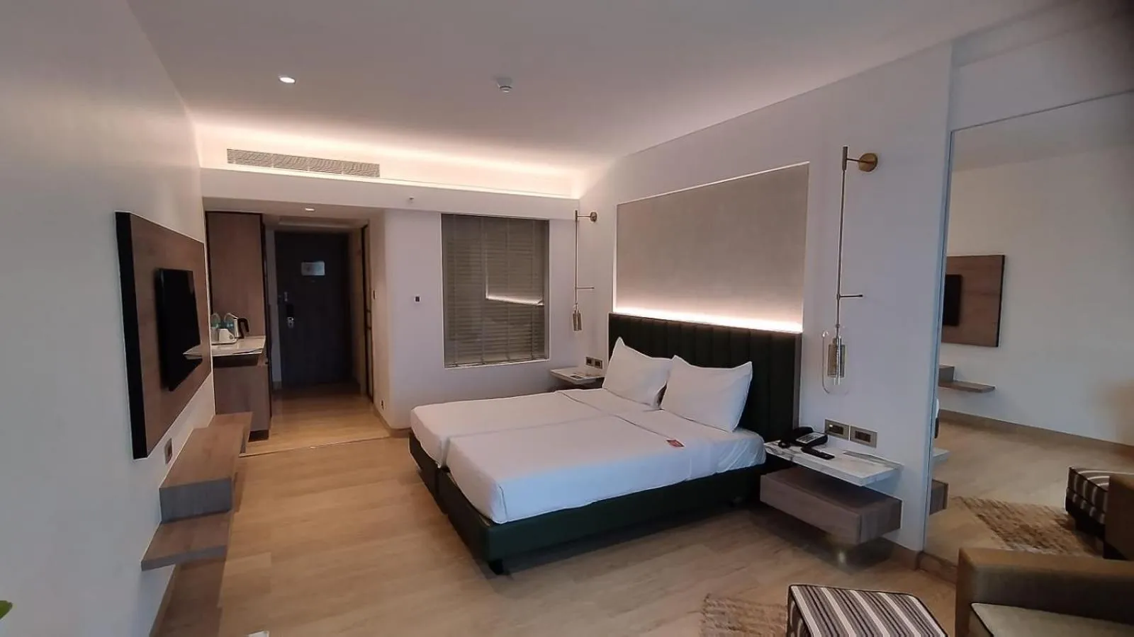 Bed in Mirage Hotel, Mumbai International Airport