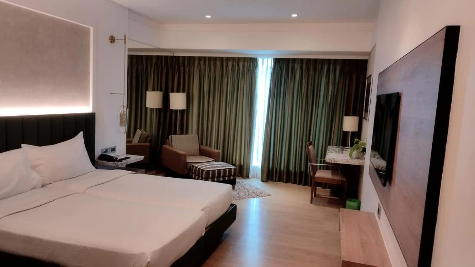 Bed in Mirage Hotel, Mumbai International Airport