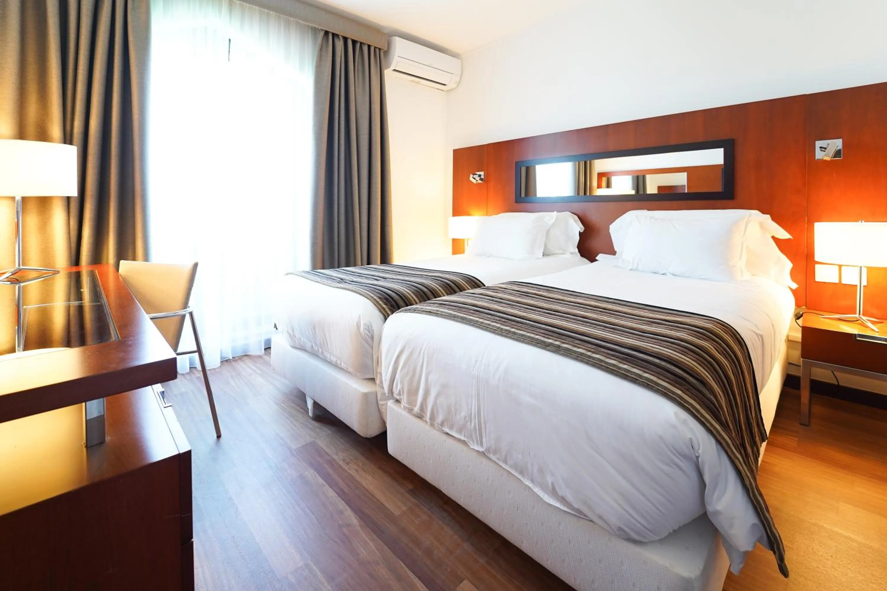 Bed in Legendary Lisboa Suites