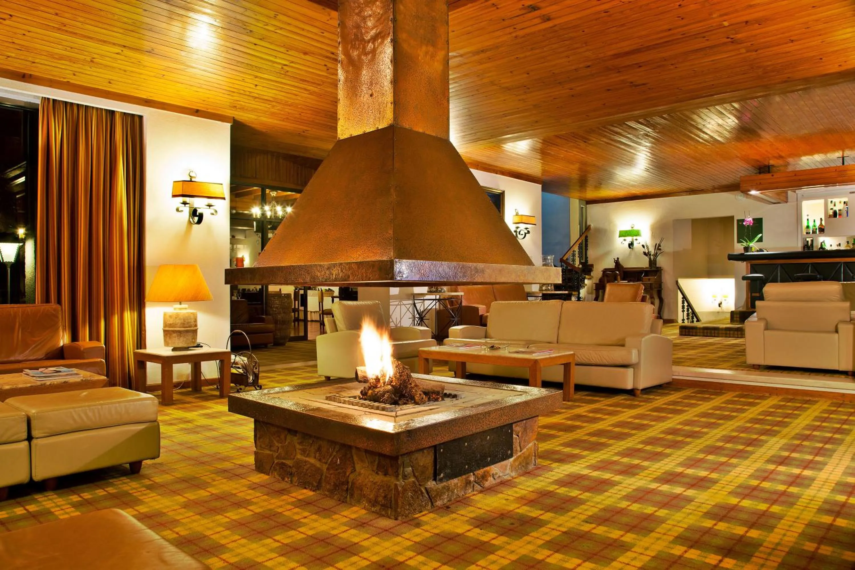 Communal lounge/ TV room in Lago Azul Eco Hotel